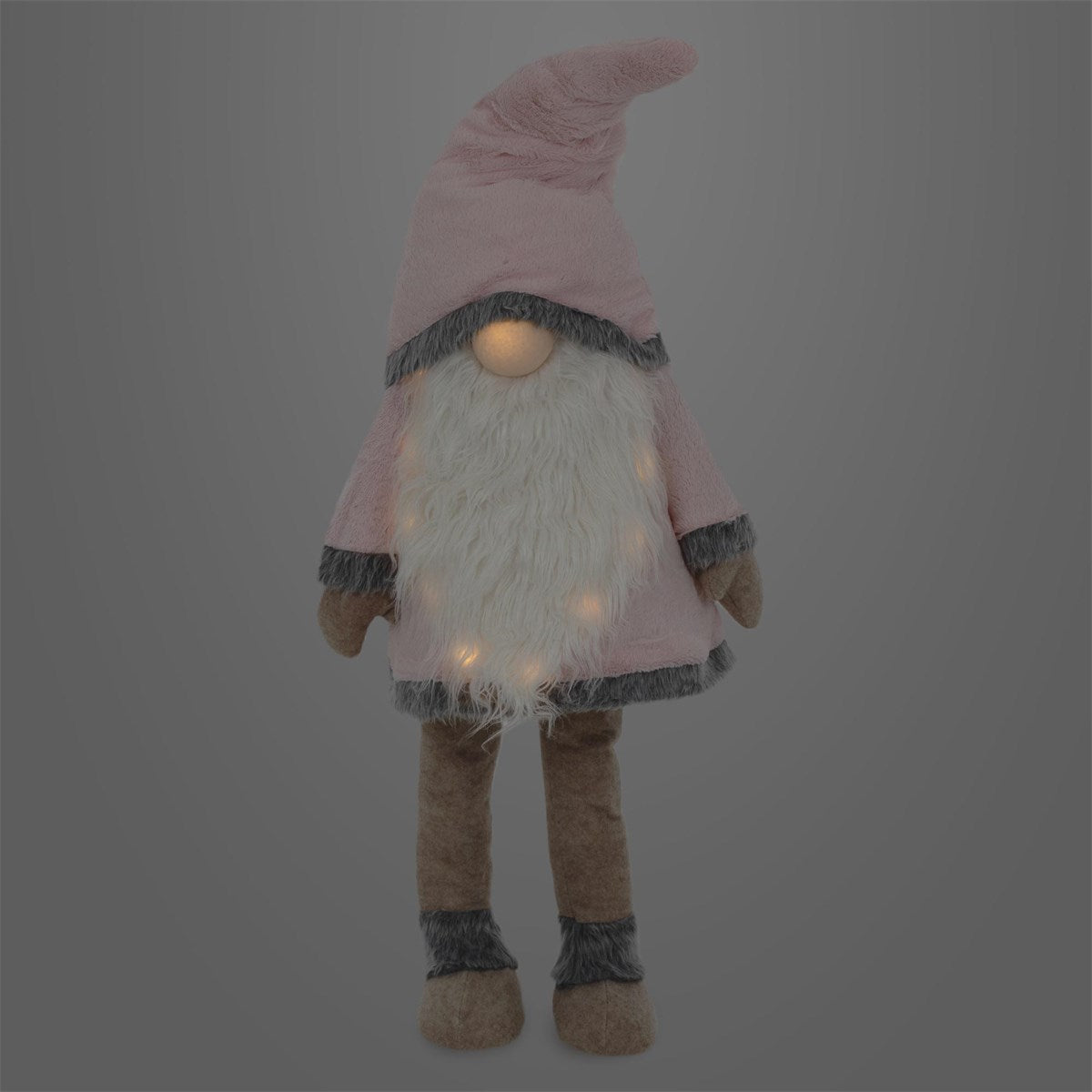Figura de gnomo de peluche con gorro rosa y puntos luminosos.