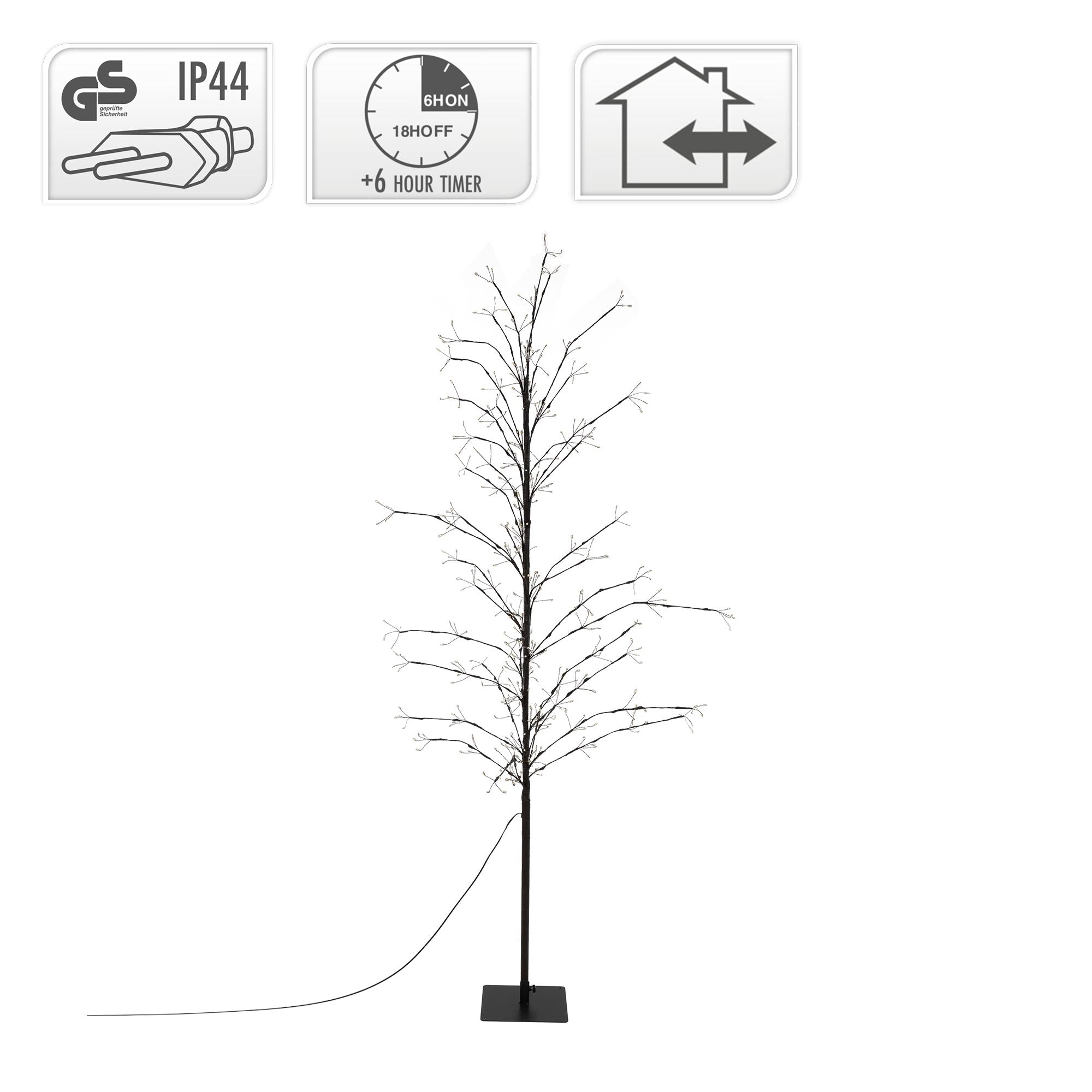 Árbol delgado iluminado con una base estable.