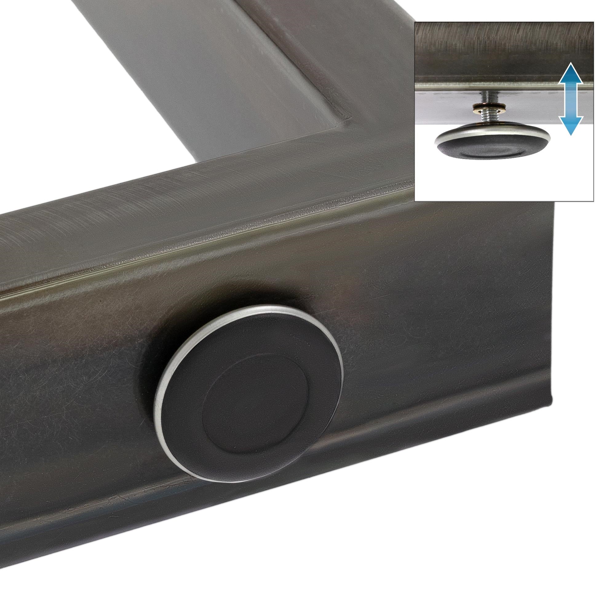 Close-up of a table frame with an adjustable foot.