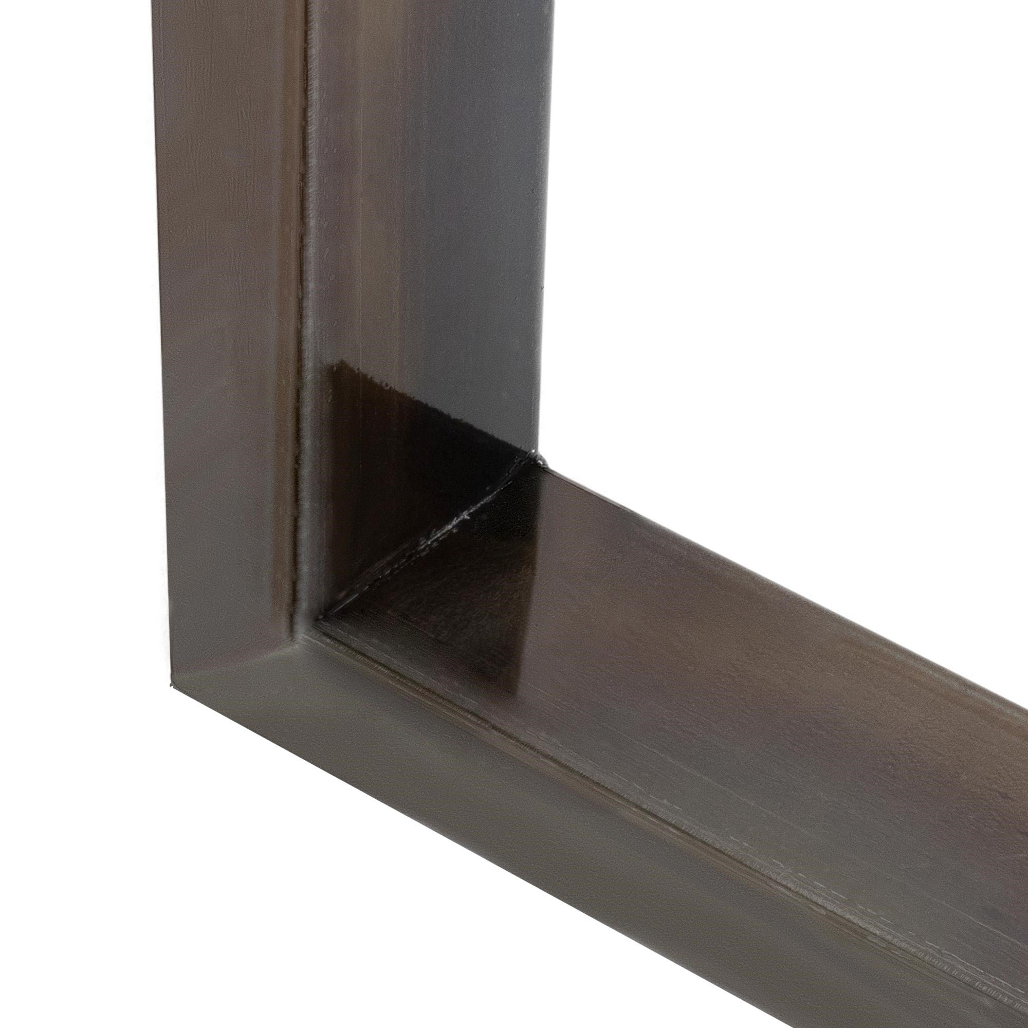 Close-up of a metal frame corner with a weld seam.