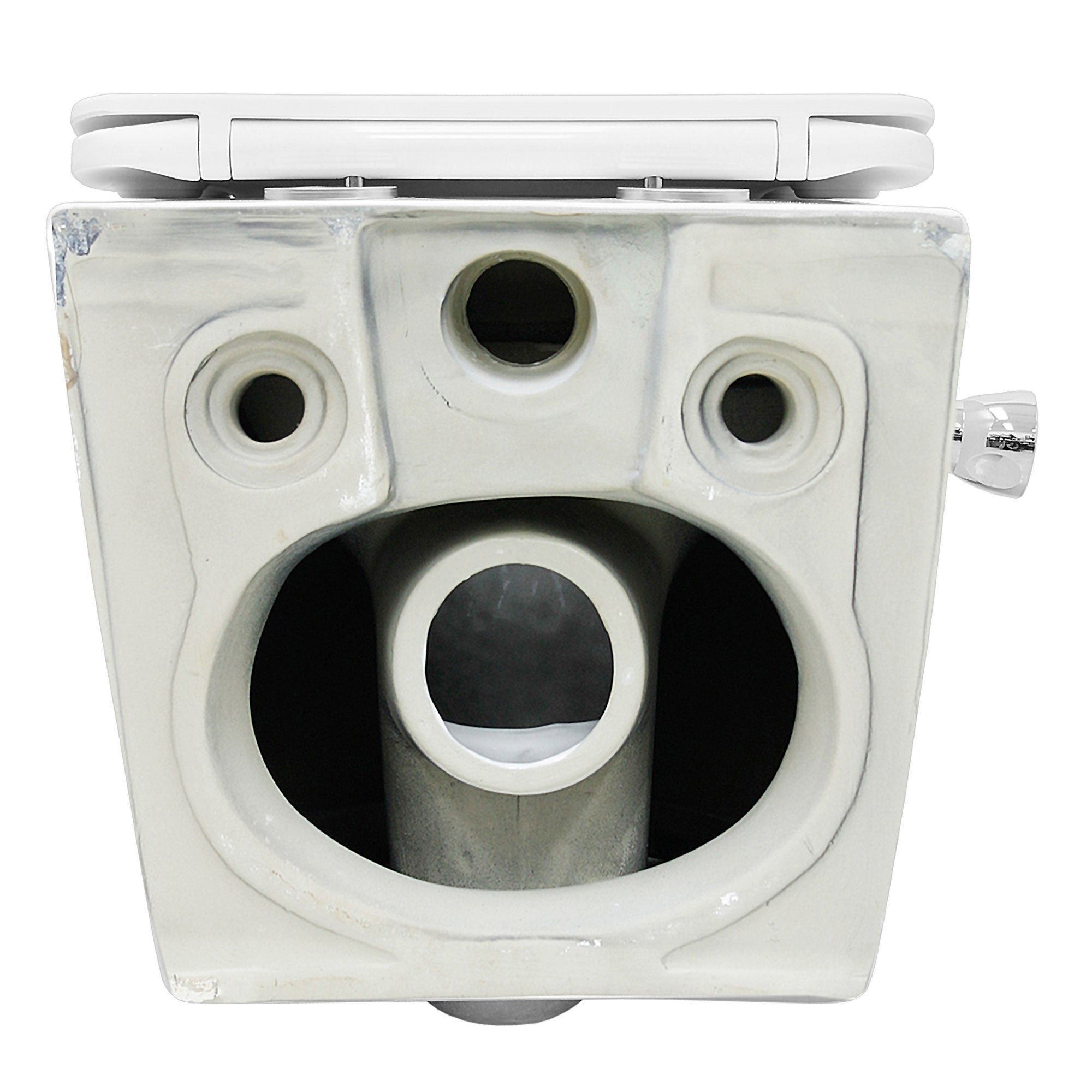 View of the underside of a WC with multiple openings.