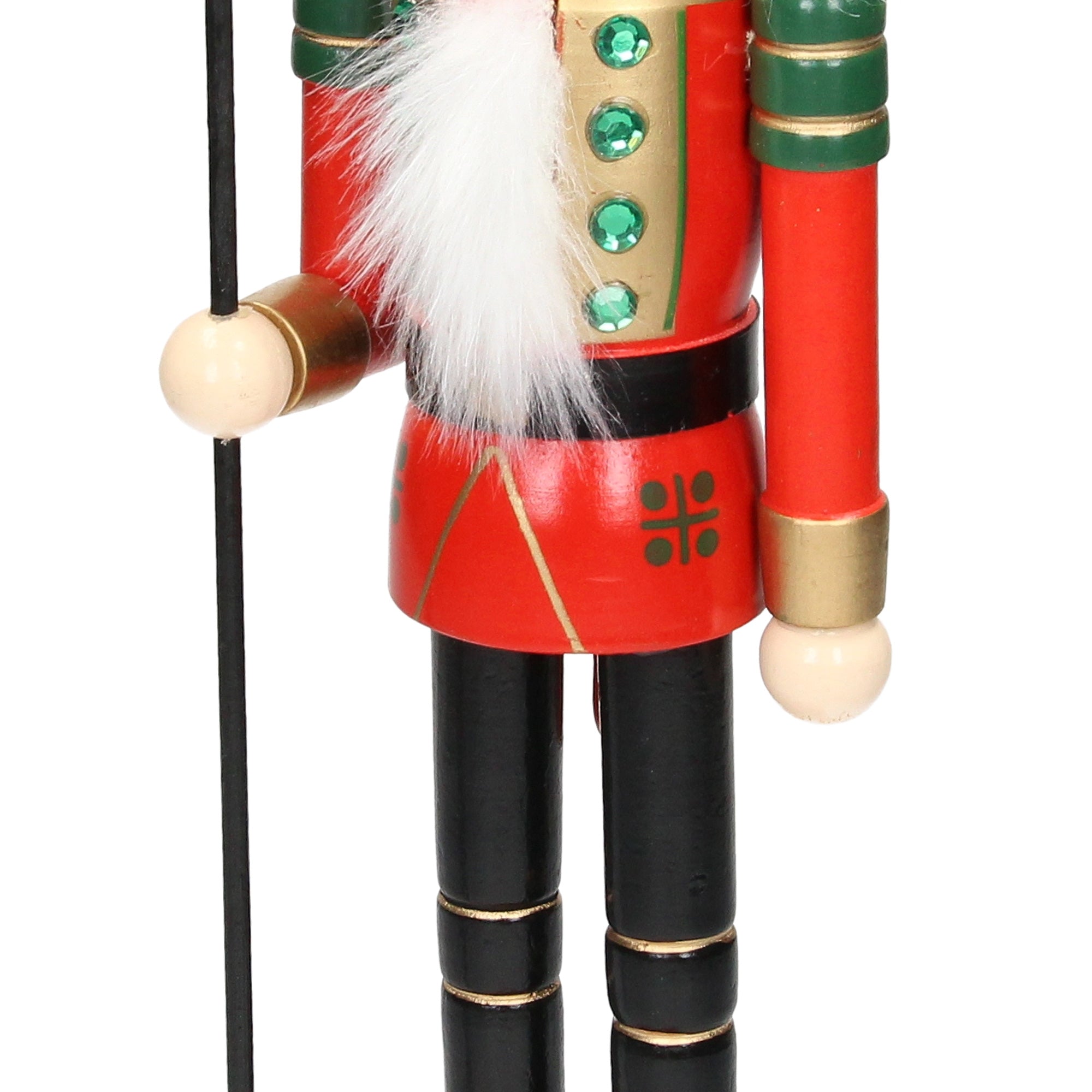 Close-up of a nutcracker in red and green with white hair.