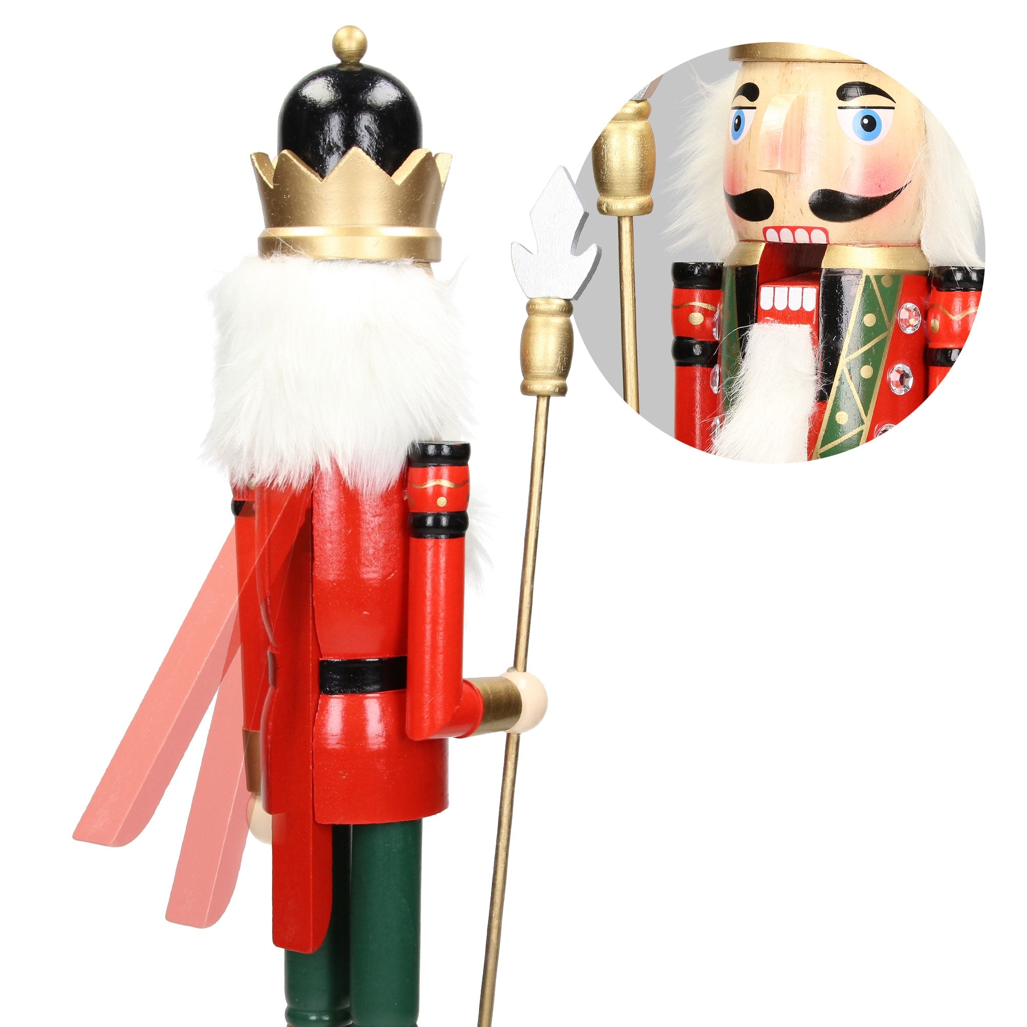 Detail view of a nutcracker with crown and scepter.
