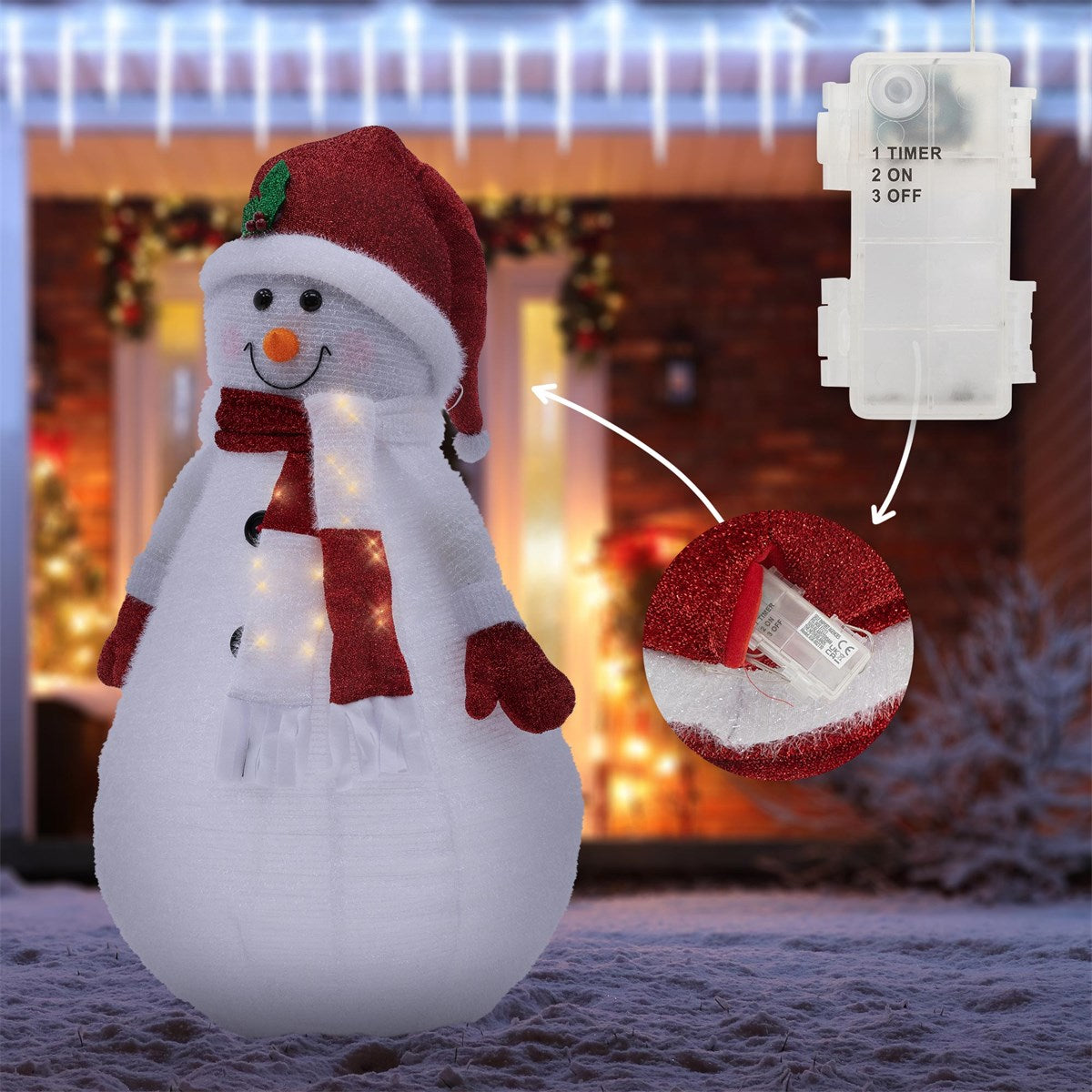 Ein Schneemann mit rotem Hut und Schal, umgeben von Lichtern und einem Schalter.