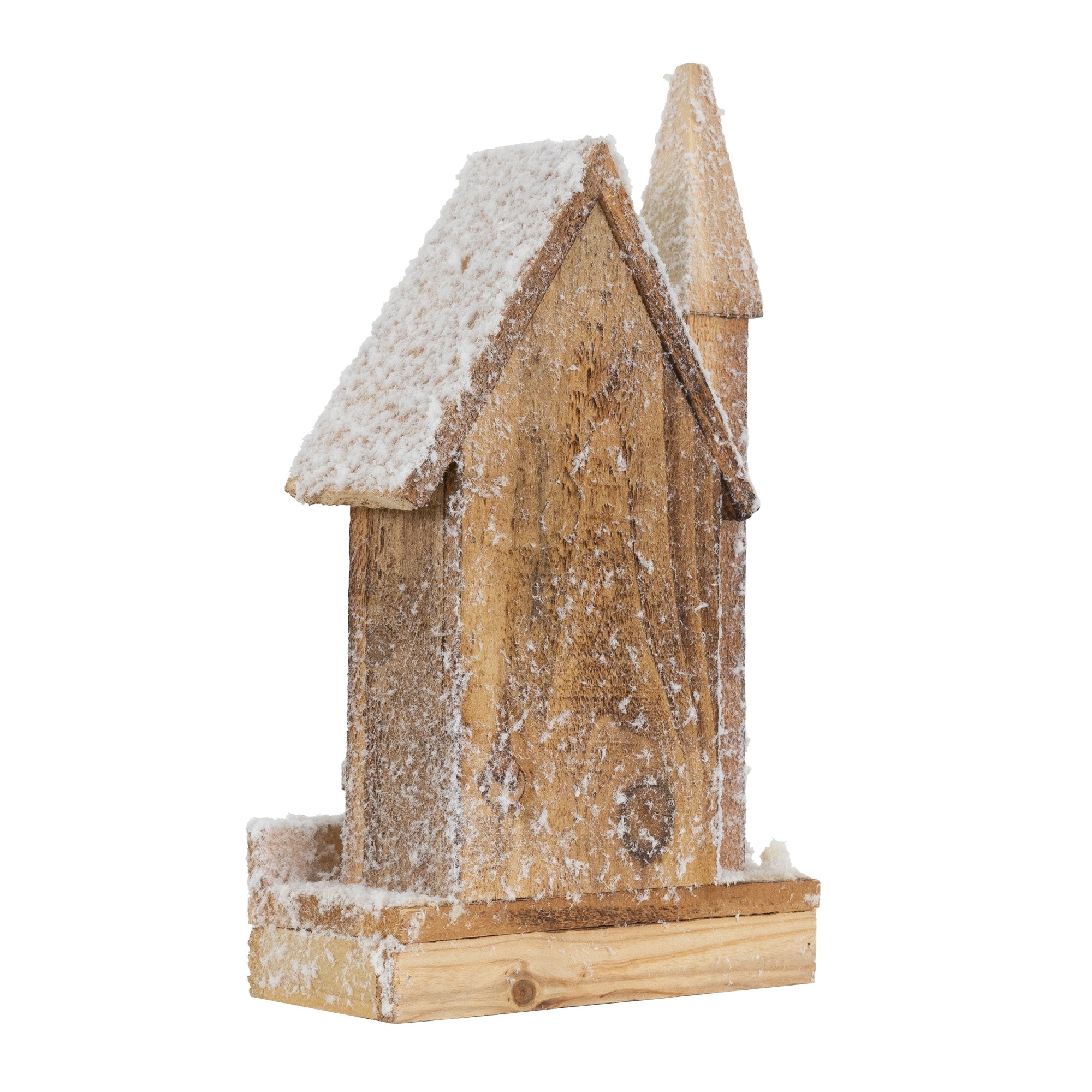 Maison en bois avec un toit enneigé et un petit clocher.