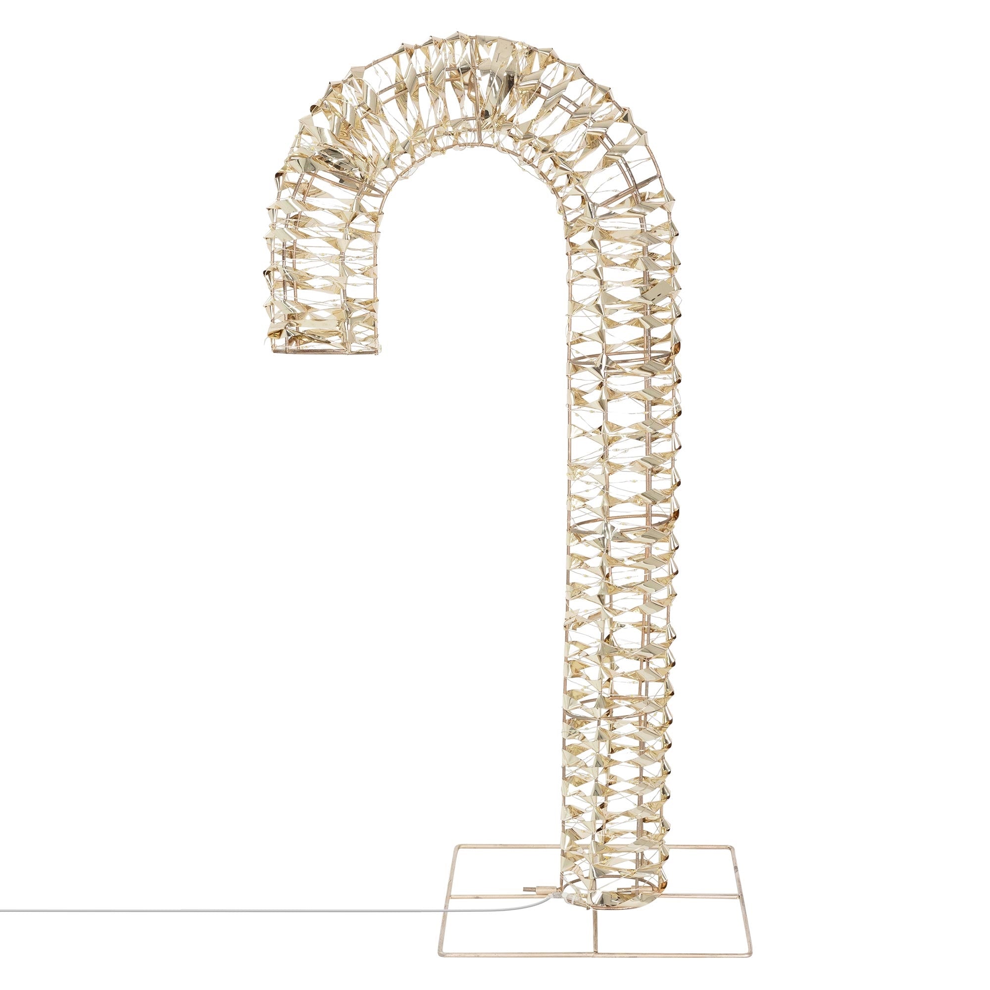 Bogenförmige Lampe aus transparentem Material auf einem weißen Hintergrund.