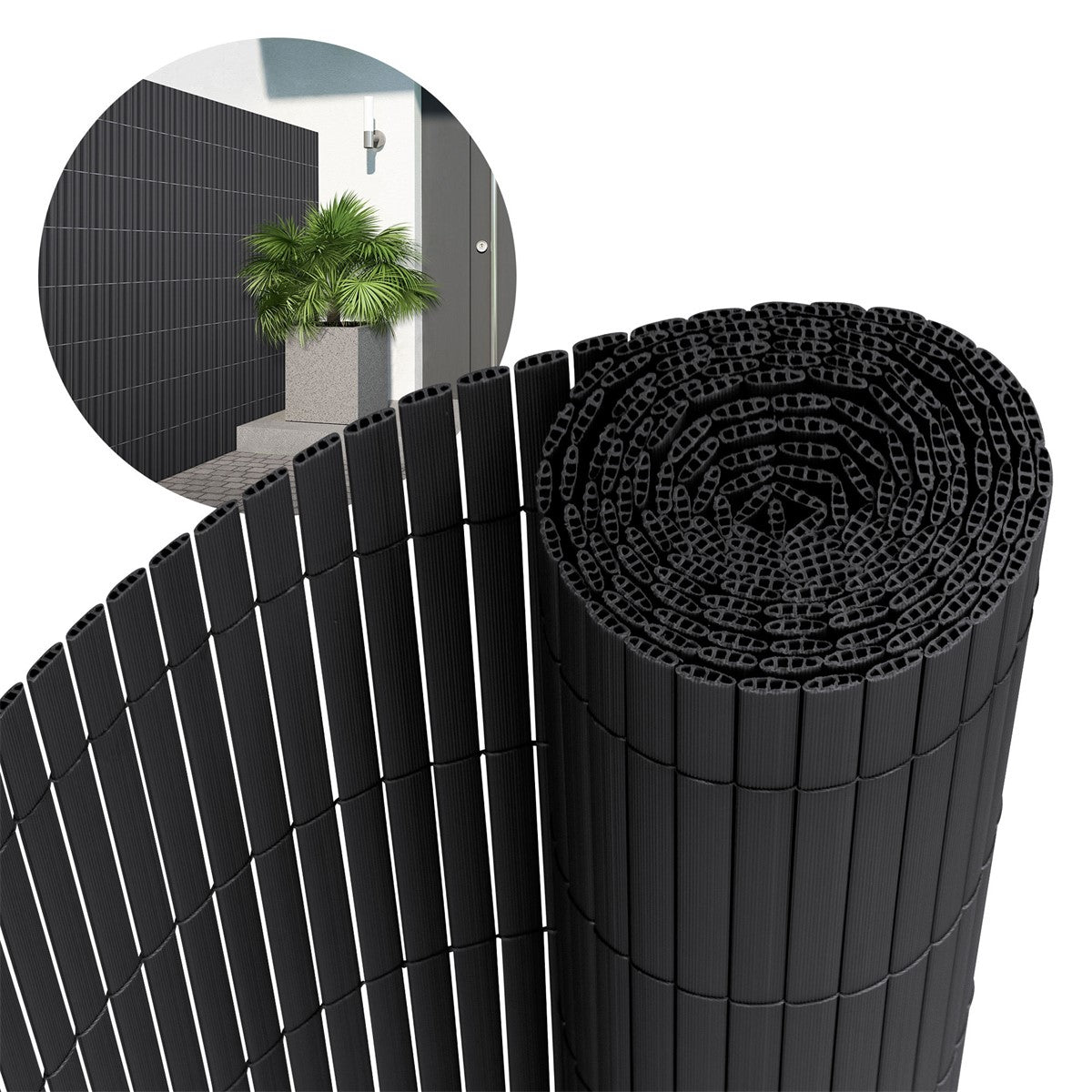 Rolled-up privacy screen made of black PVC strips with a plant in the background.