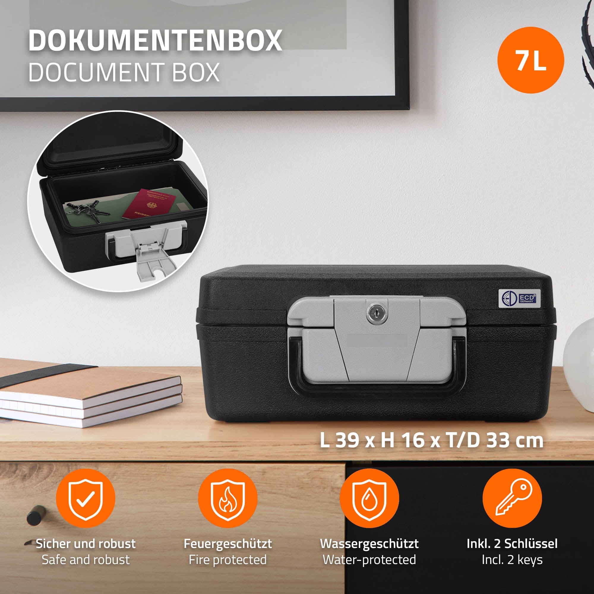 Dokumentenbox mit geöffnetem Deckel, Inhalt sichtbar, auf einem Tisch.