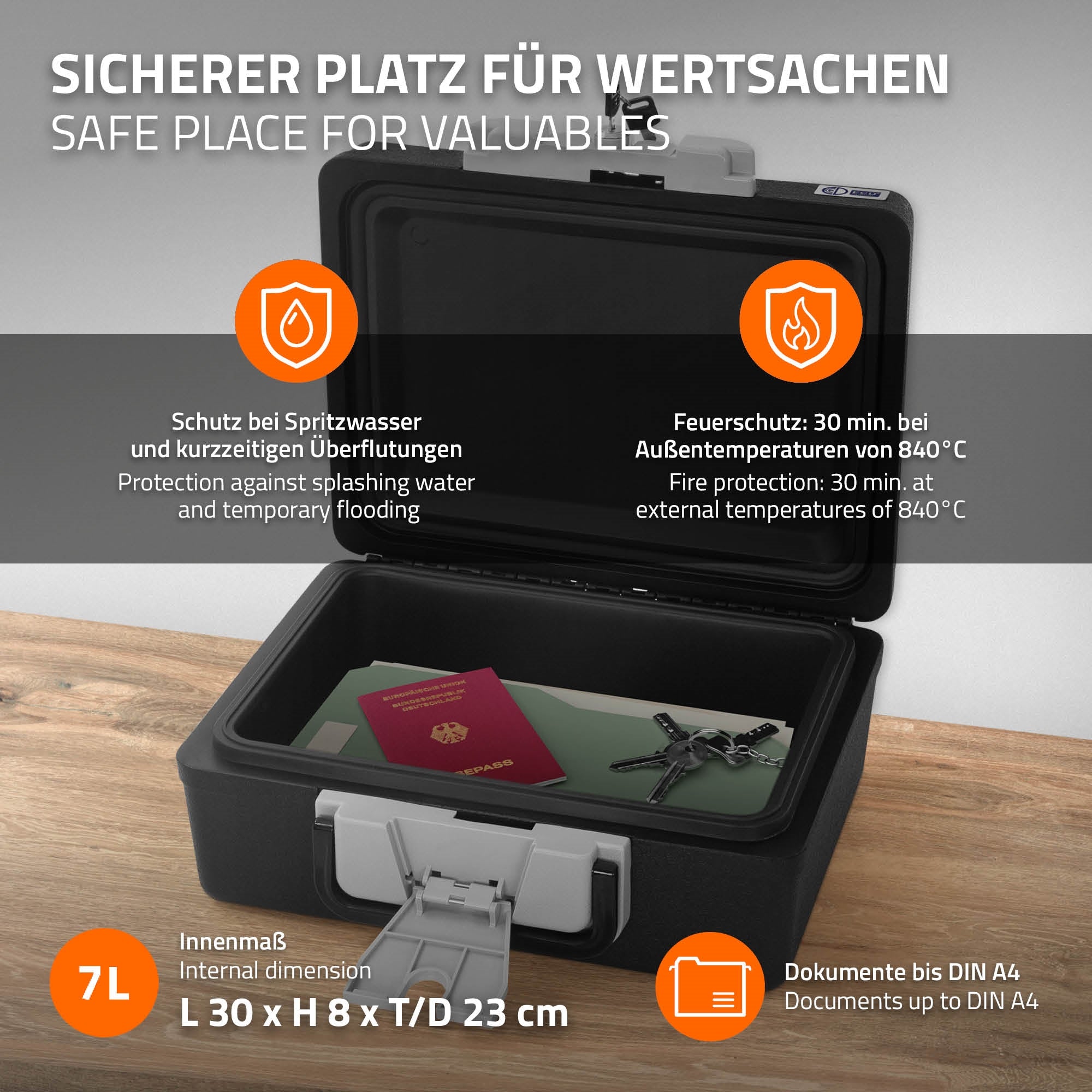 Schwarze Wertschutzbox mit Schutz vor Wasser und Feuer, auf grauem Hintergrund.