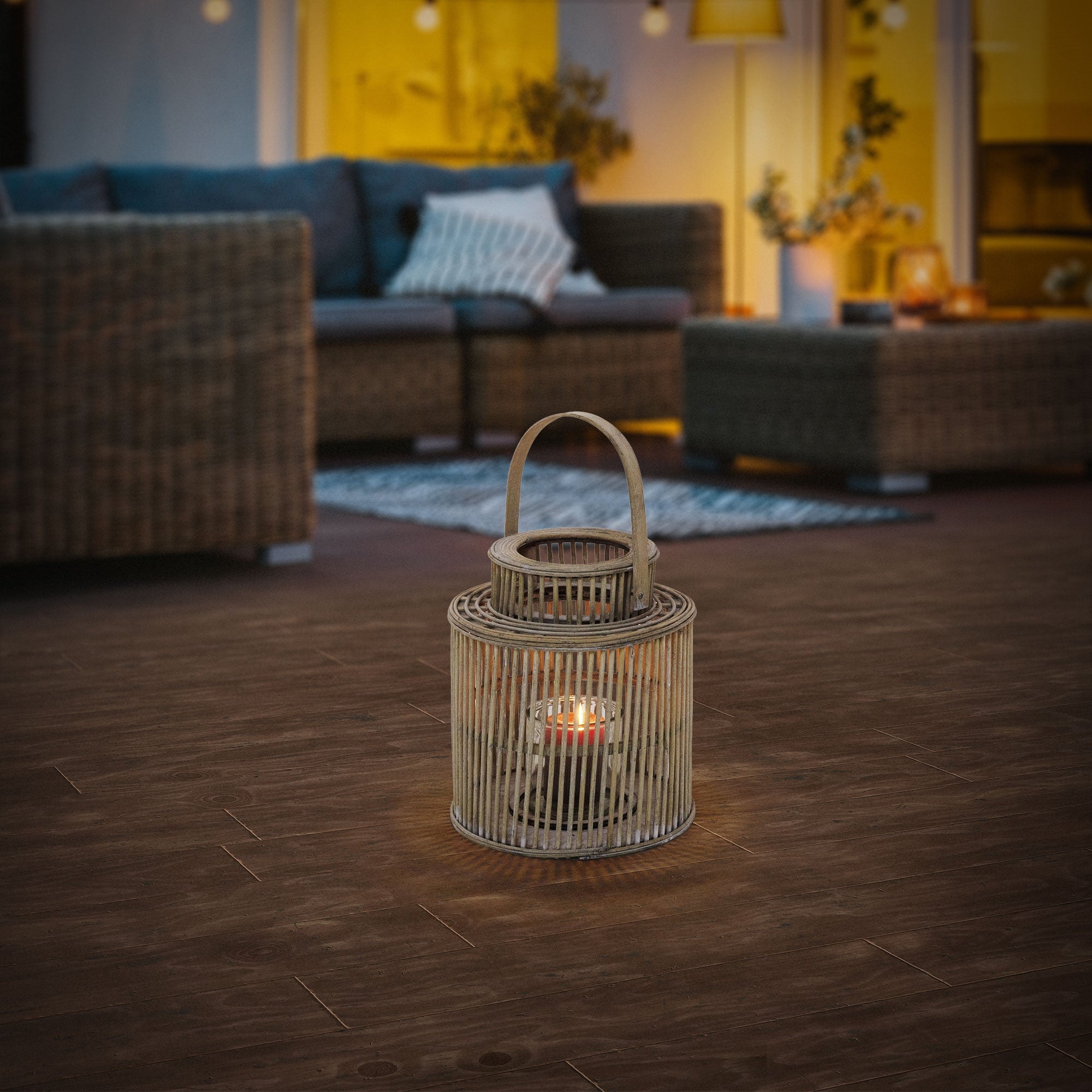 Bamboo lantern on a floor, surrounded by furniture in a cozy room.
