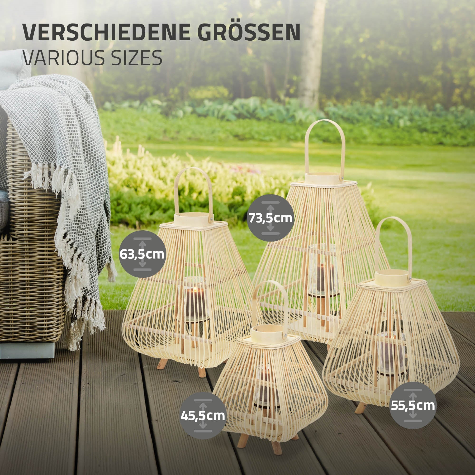 Different sizes of rattan lanterns on a garden floor.