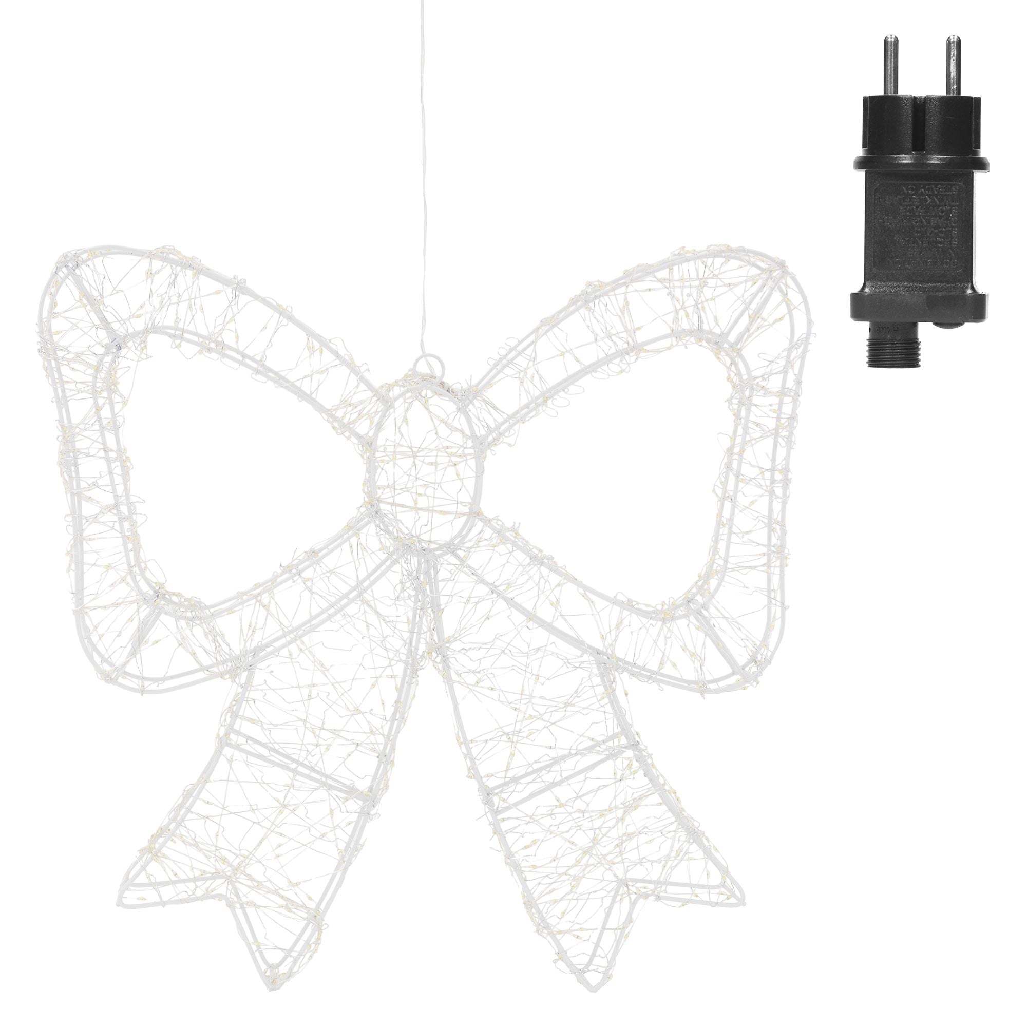 Weißer Lichtbogen in Form einer Schleife neben einem schwarzen Stecker.