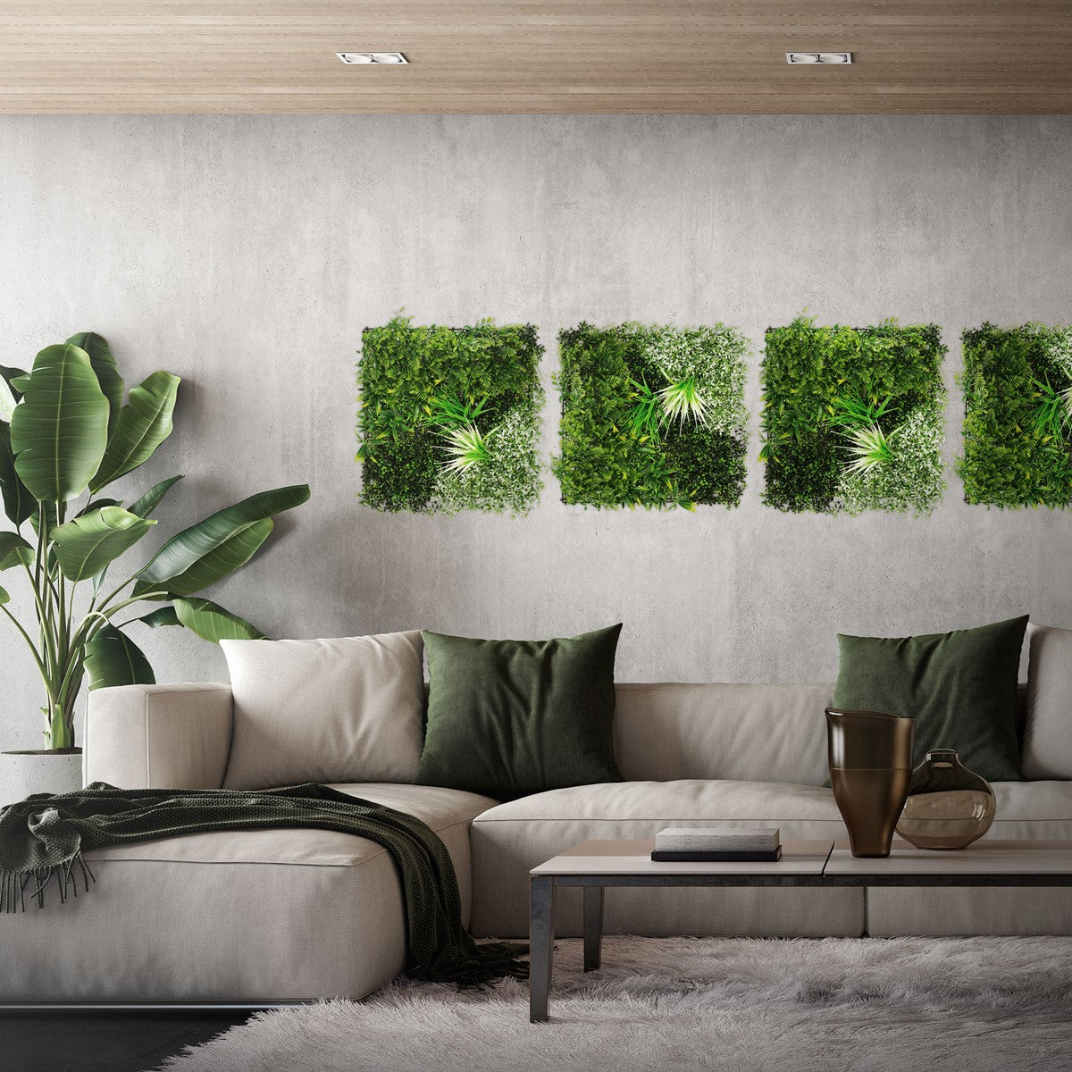 Wohnzimmer mit grünen Pflanzenbildern an der Wand und einer beigen Couch.