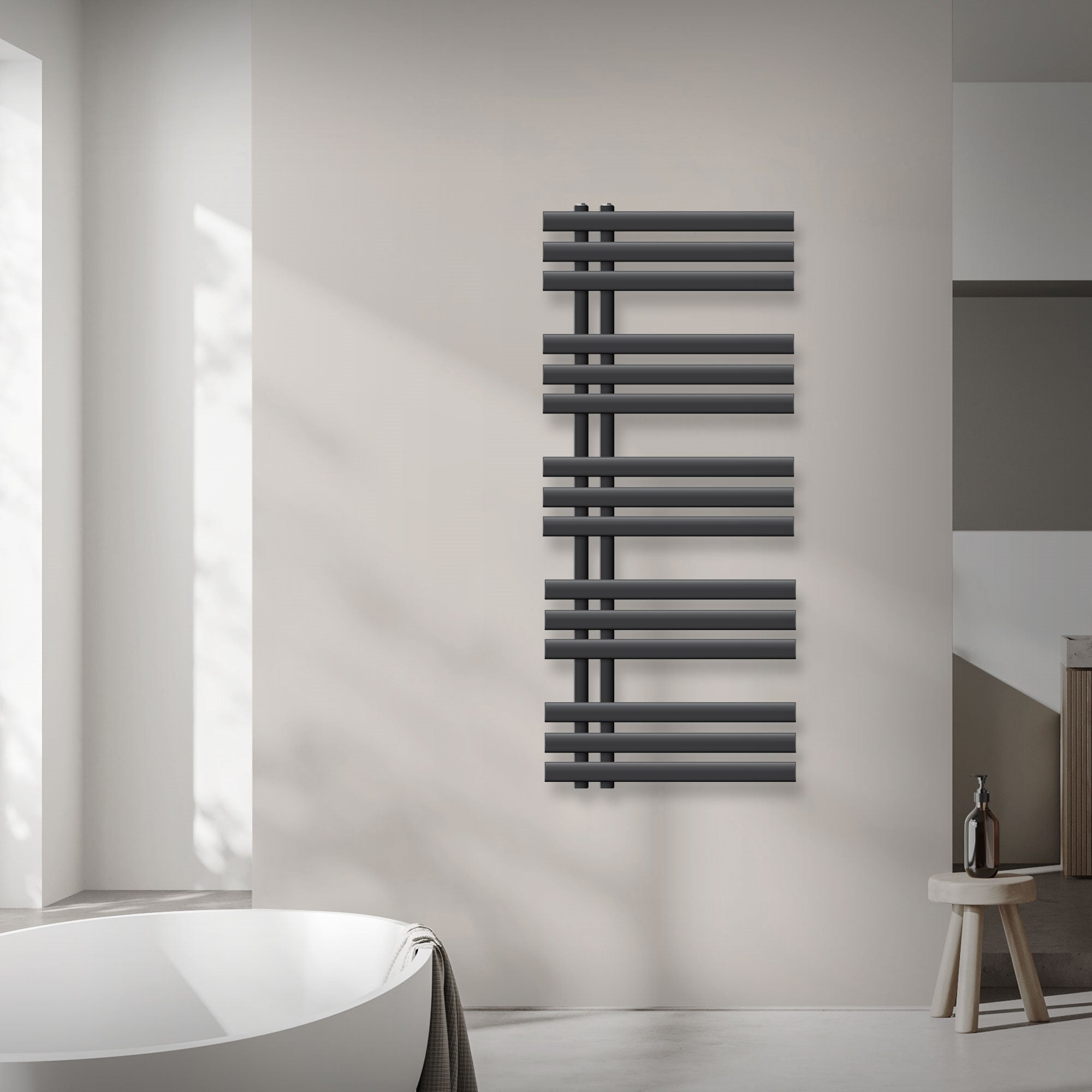 An anthracite towel radiator on a wall with a bathtub.