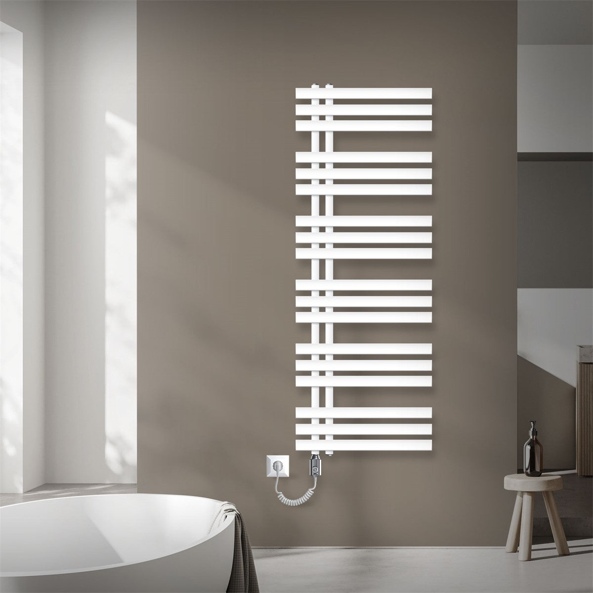 White electric radiator on a wall in a bathroom.