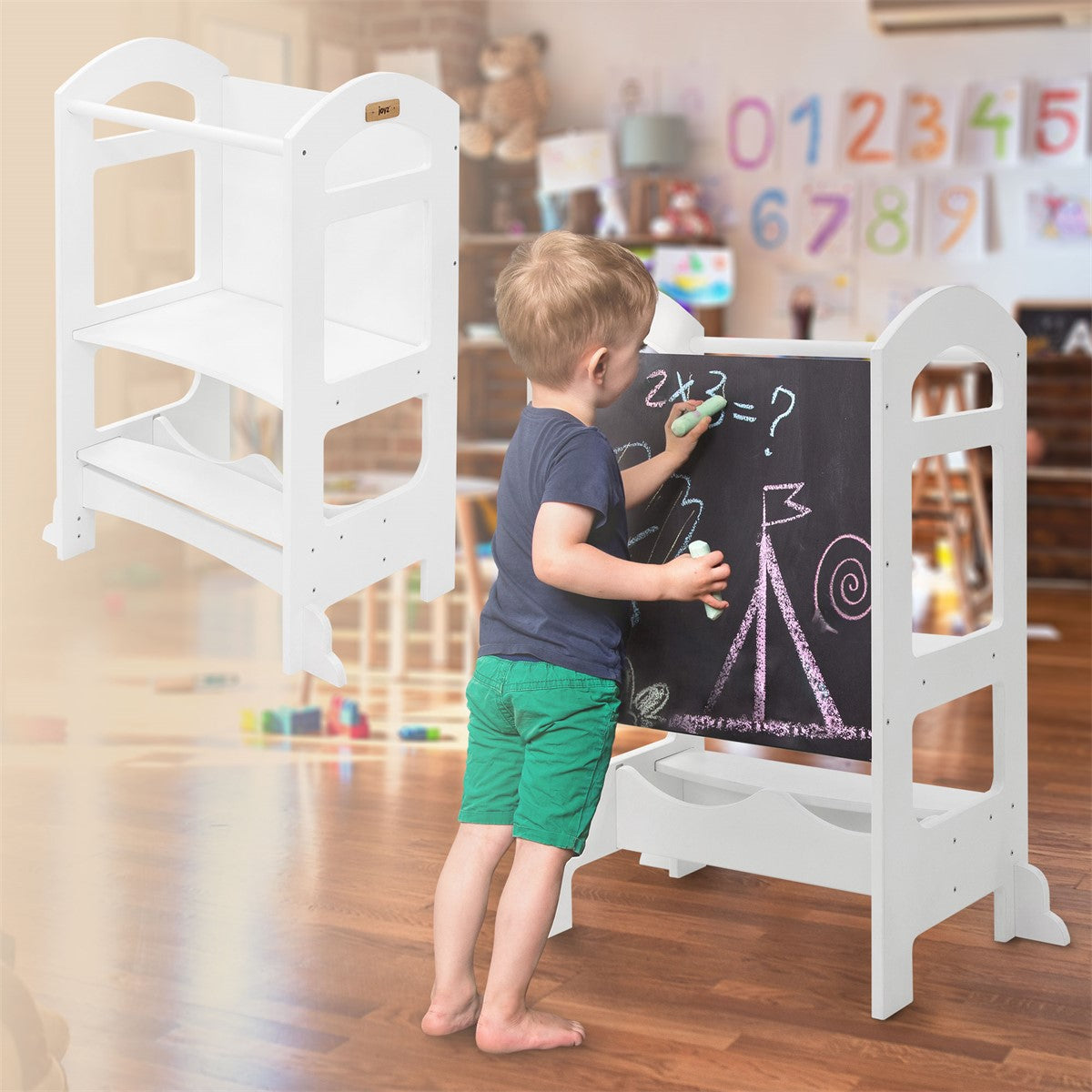 A child is drawing on a board in a playroom.