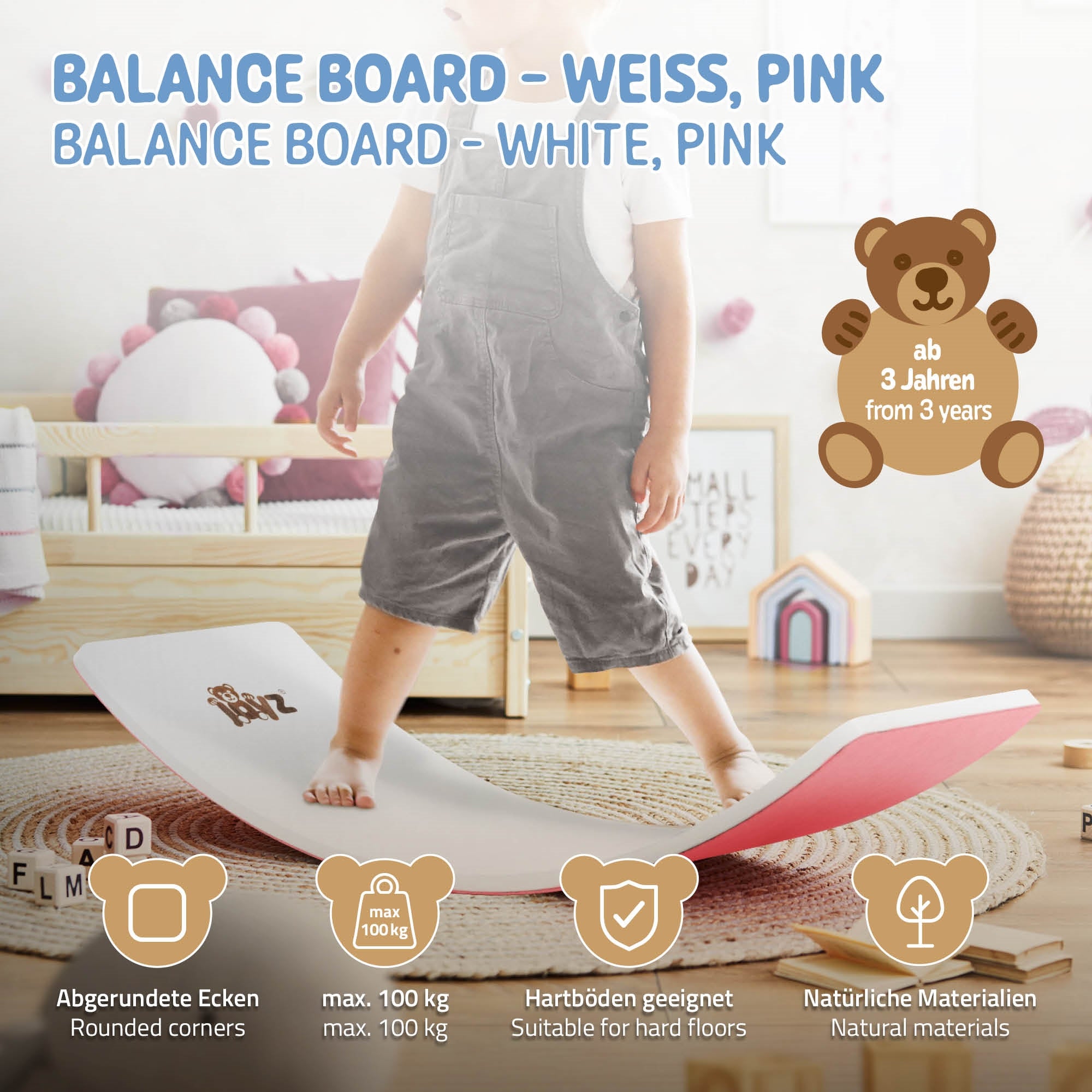 Planche d'équilibre en blanc et rose, un enfant se tient dessus, coins arrondis.