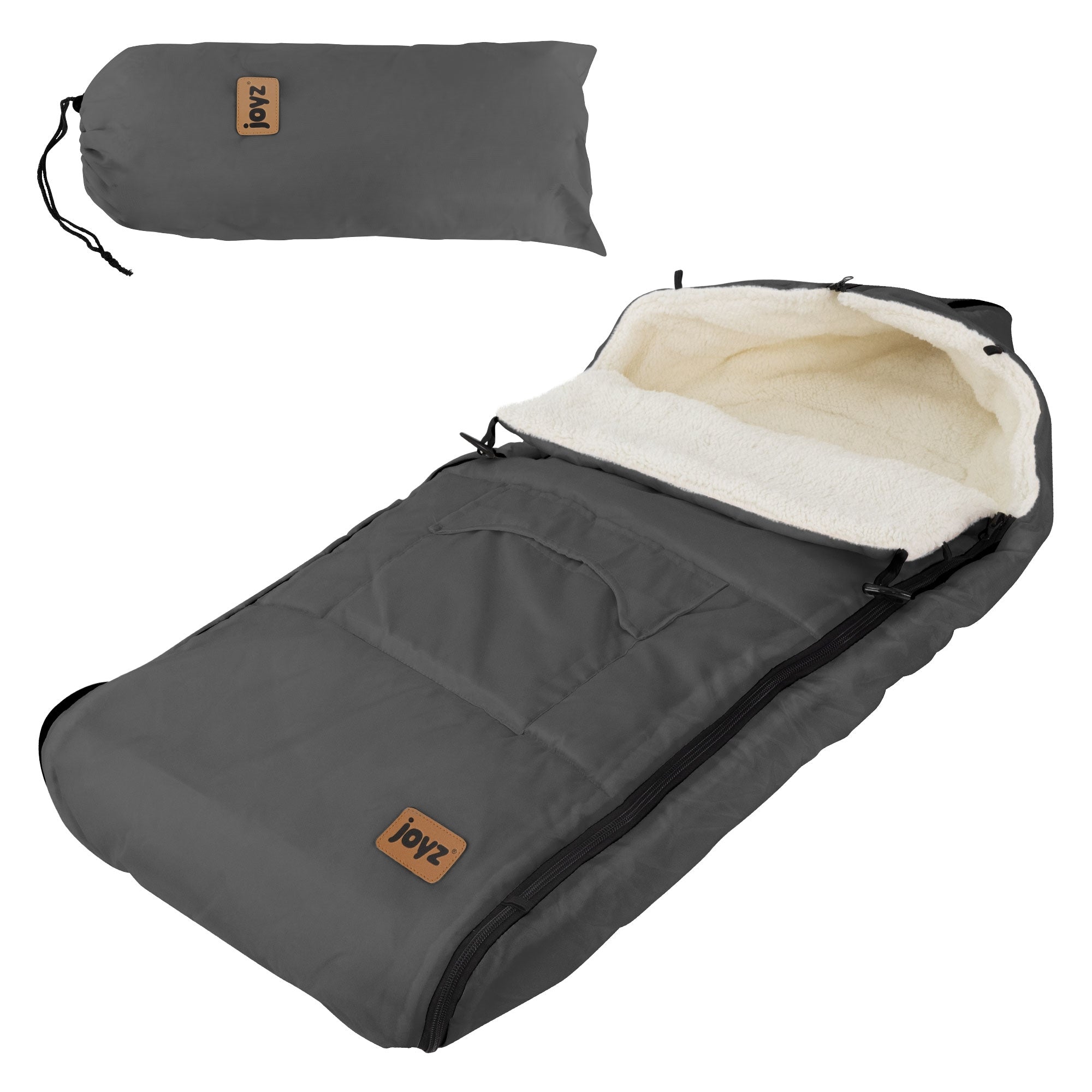 Schlafsack in Grau mit Innenfutter aus hellem Material und Kordelzug.