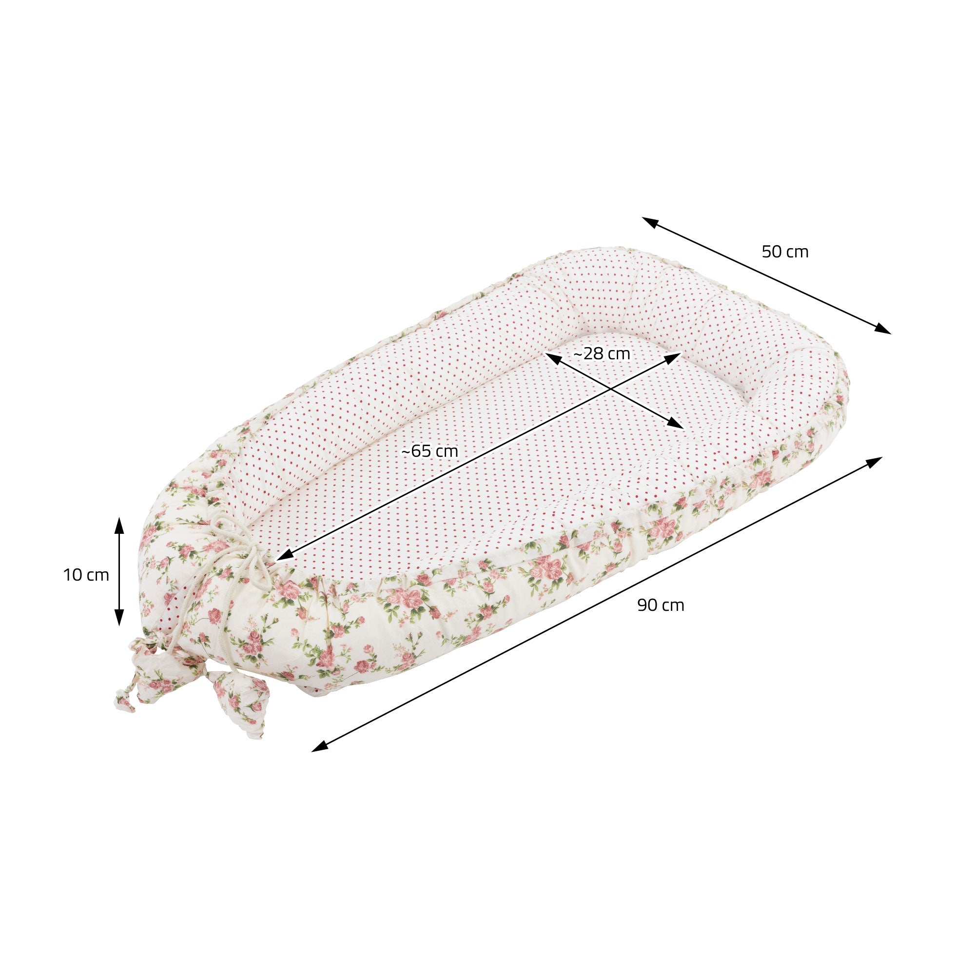 Afmetingen voor een ovale baby slaapplaats, 90 cm lang en 50 cm breed, met bloemenmotief.