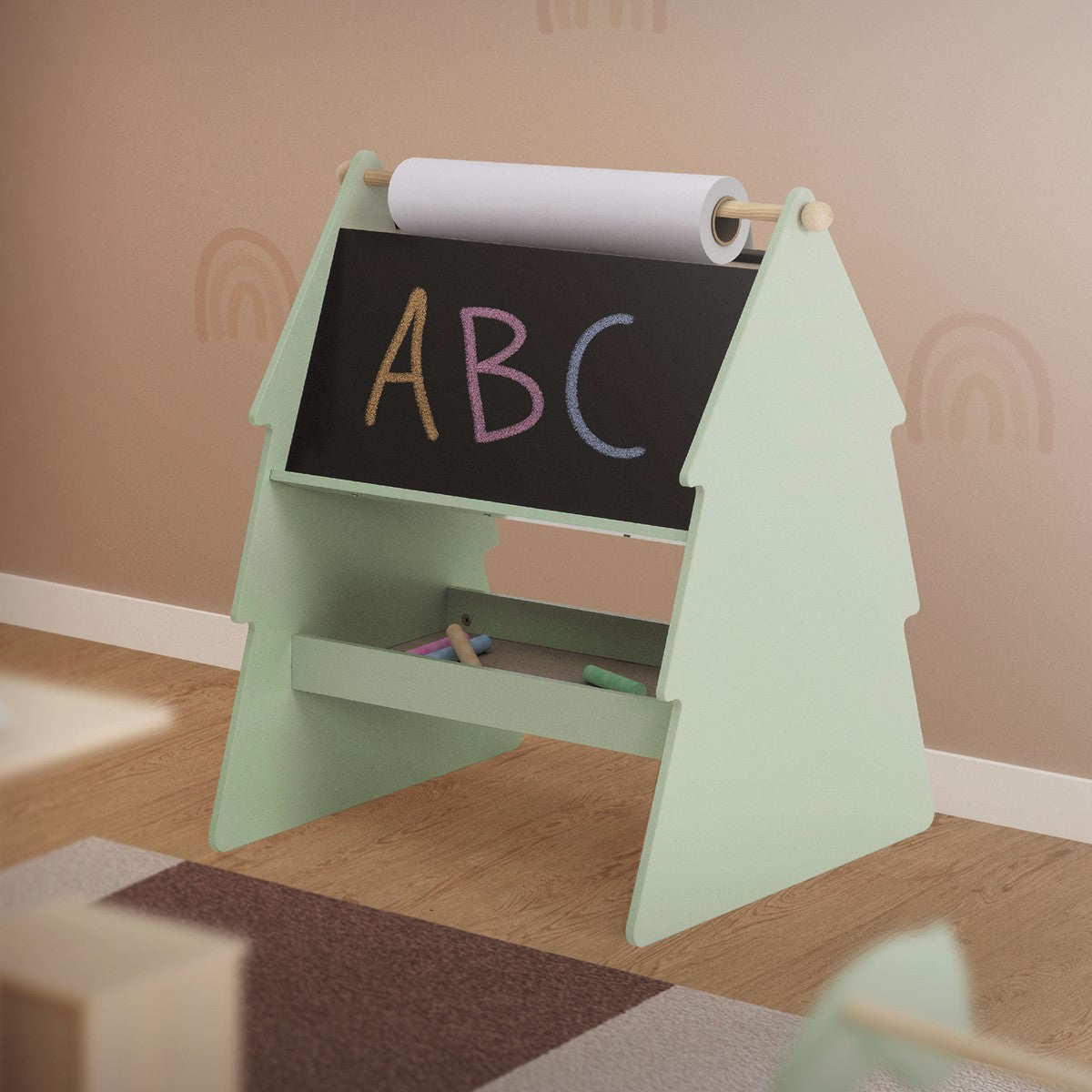A green table with a board and a paper roll holder.
