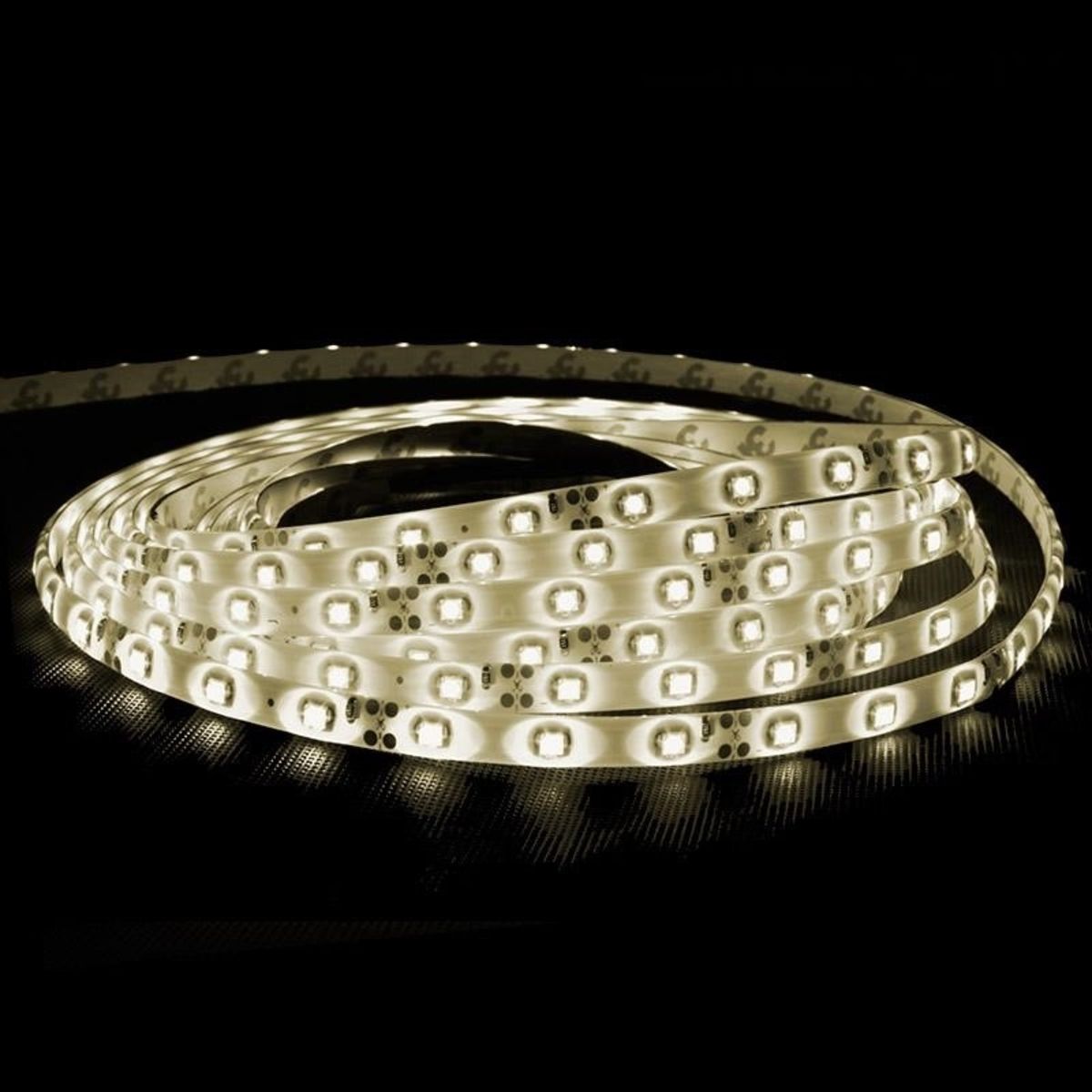 A LED light bar arranged in a spiral on a black background.