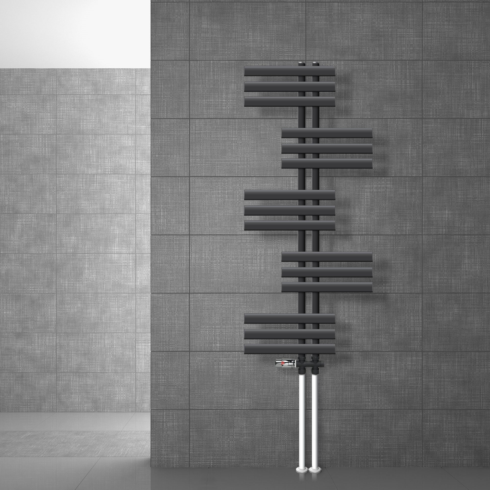 Anthracite radiator with horizontal tubes on gray floor.