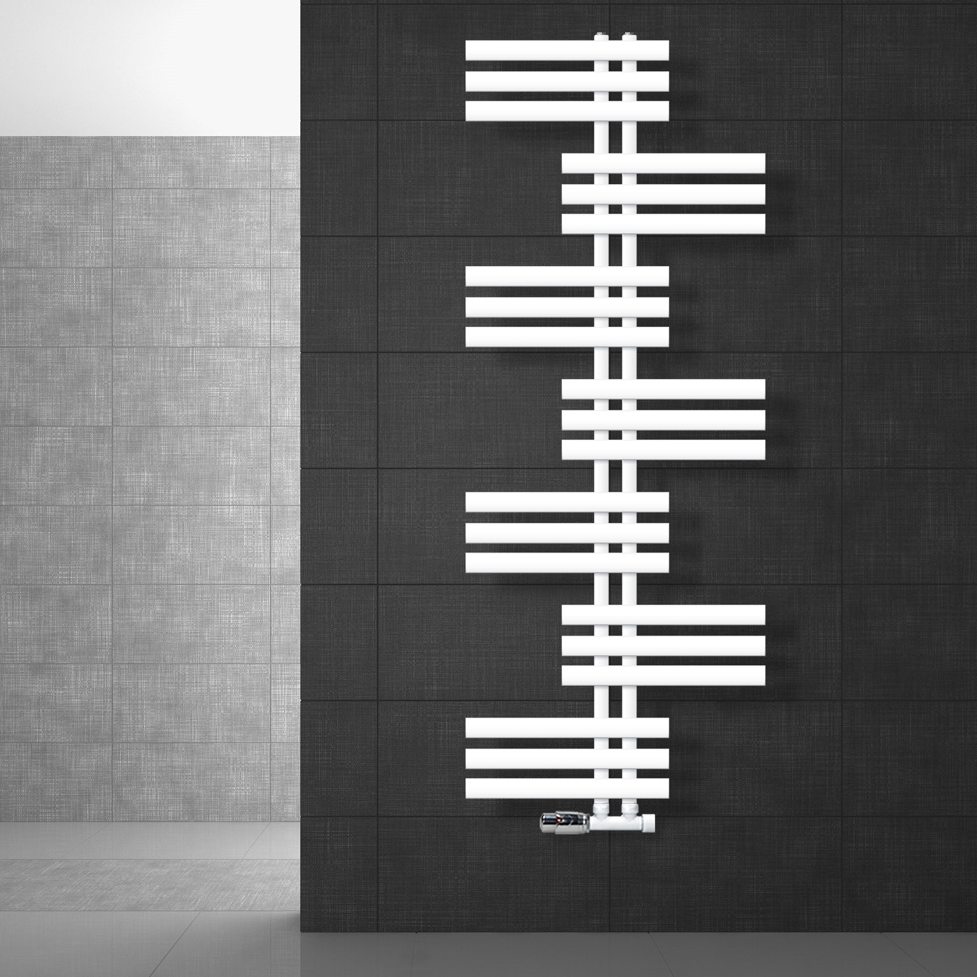 White radiator arrangement on a dark wall.