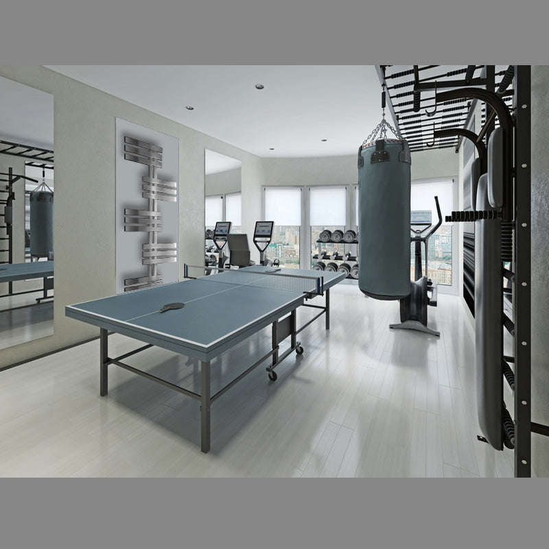 Modern training room with fitness equipment and table tennis table.
