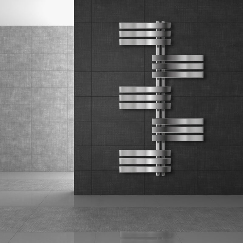 A stylized metal radiator on a dark wall.