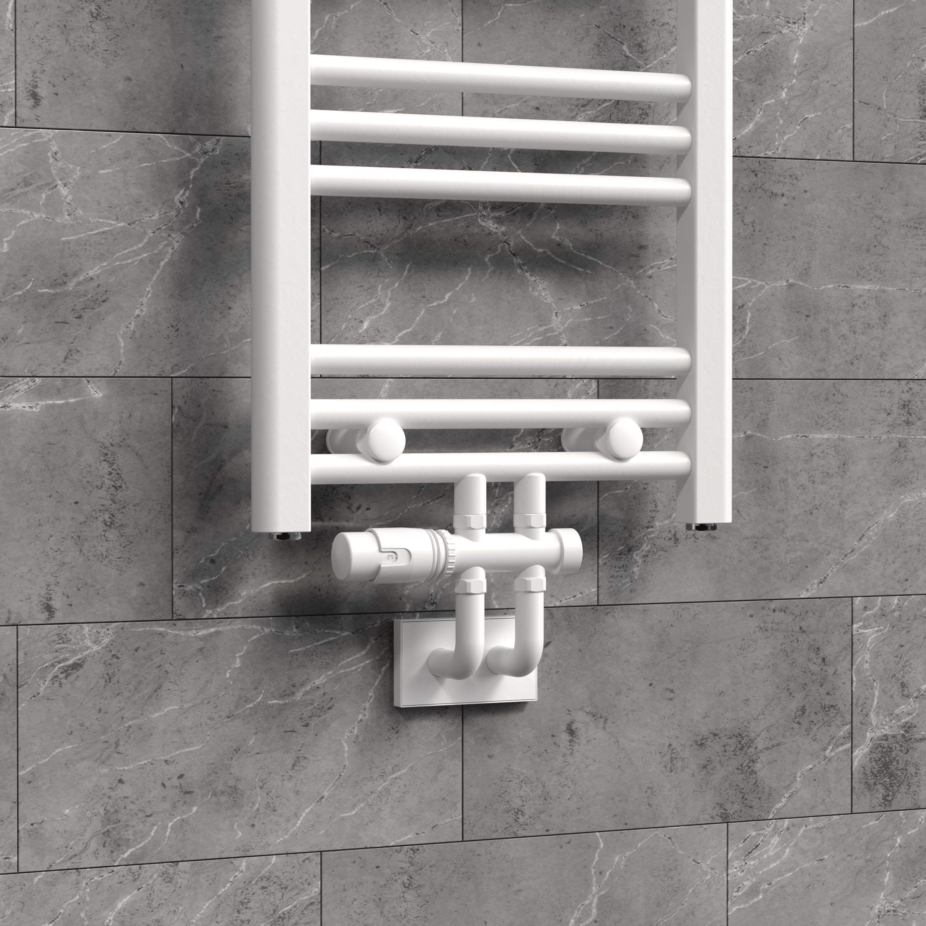 Radiateur avec raccord de radiateur connecté sur un mur gris.