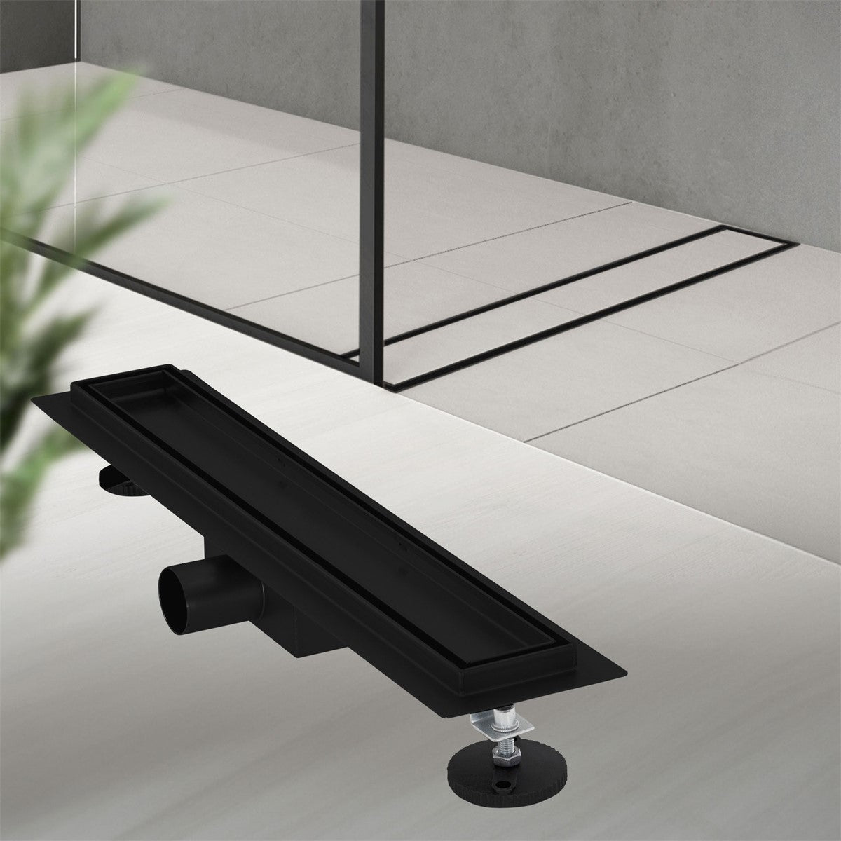 Black shower drain with a connection pipe and a bracket.