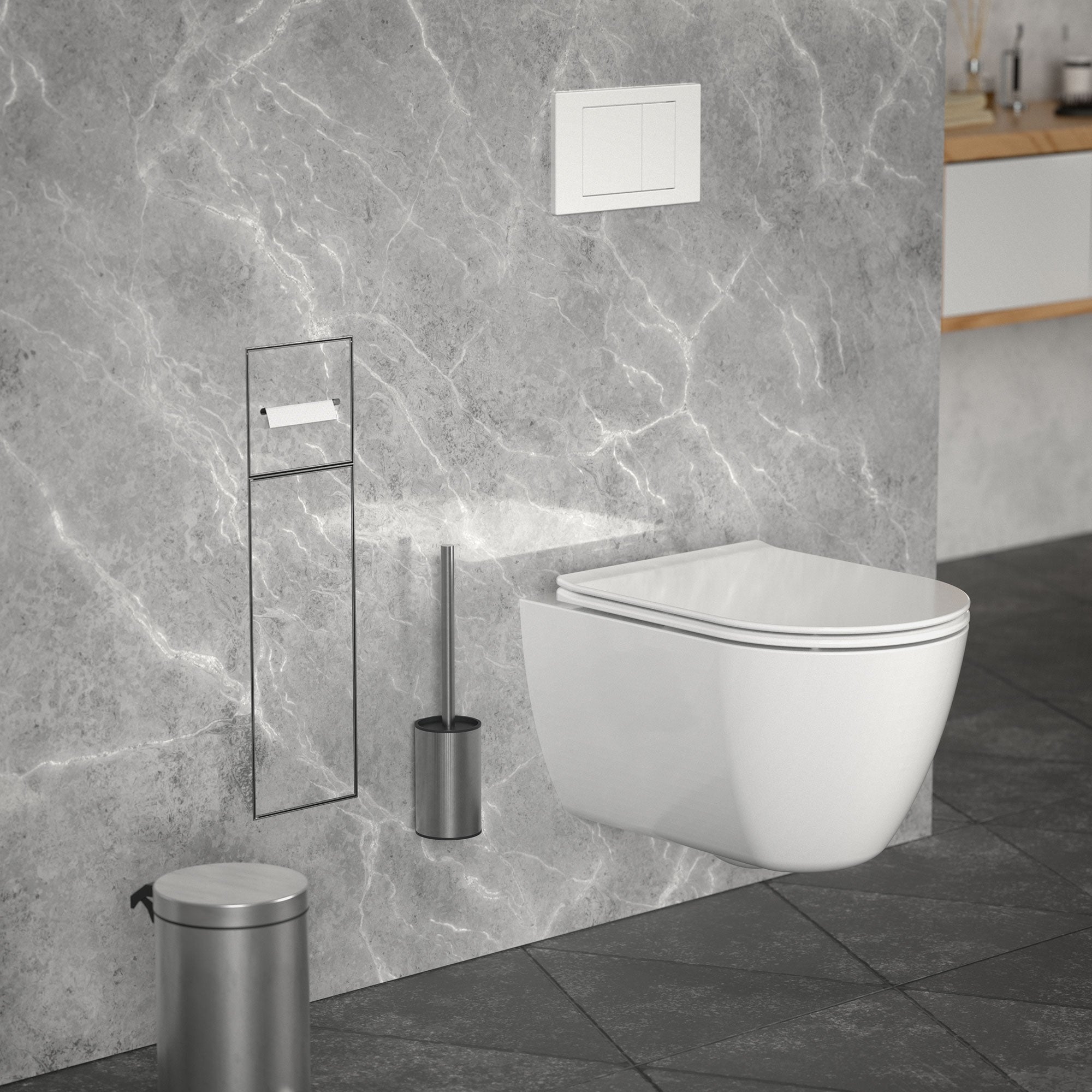 Modern bathroom with wall-mounted toilet, toilet brush, and waste bin.