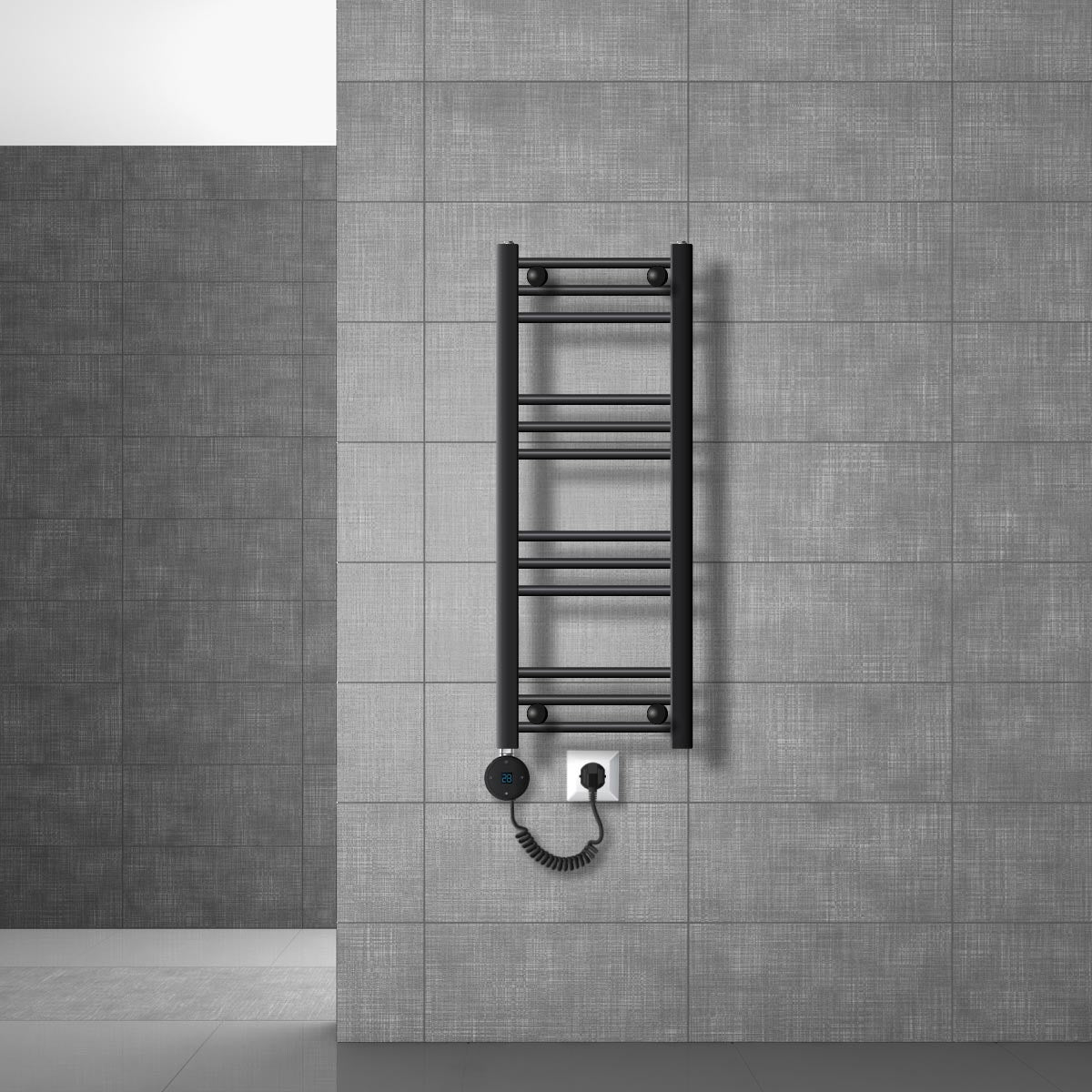 Radiateur sèche-serviettes noir avec prise sur un mur gris.