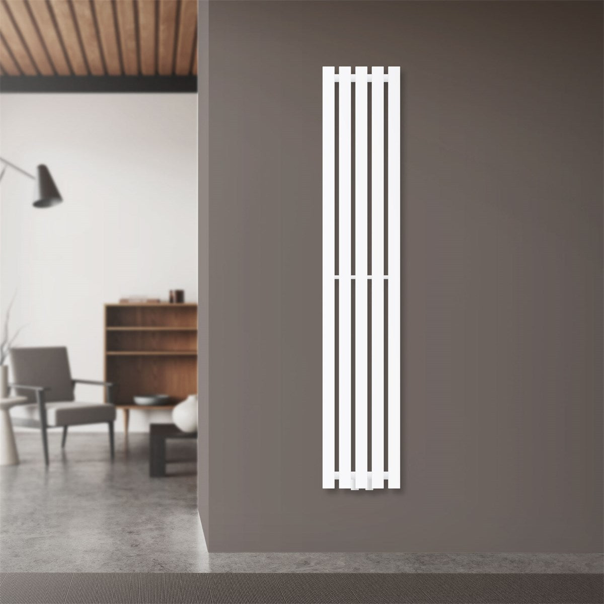 White radiator on a wall in a modern room.