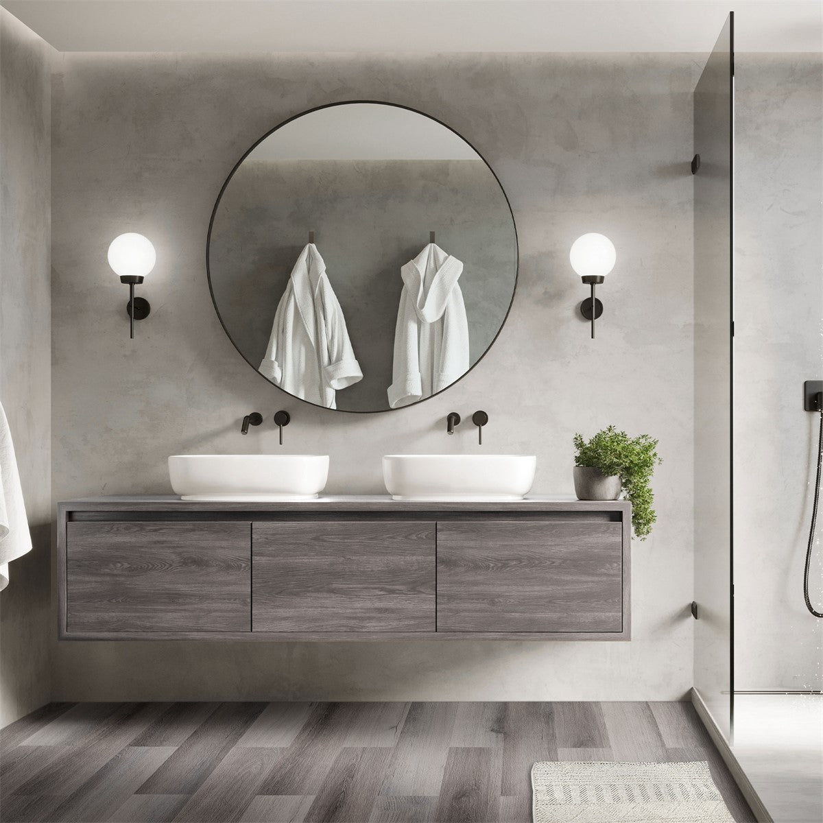 Ein modernes Badezimmer mit zwei Waschbecken und Handtüchern an der Wand.