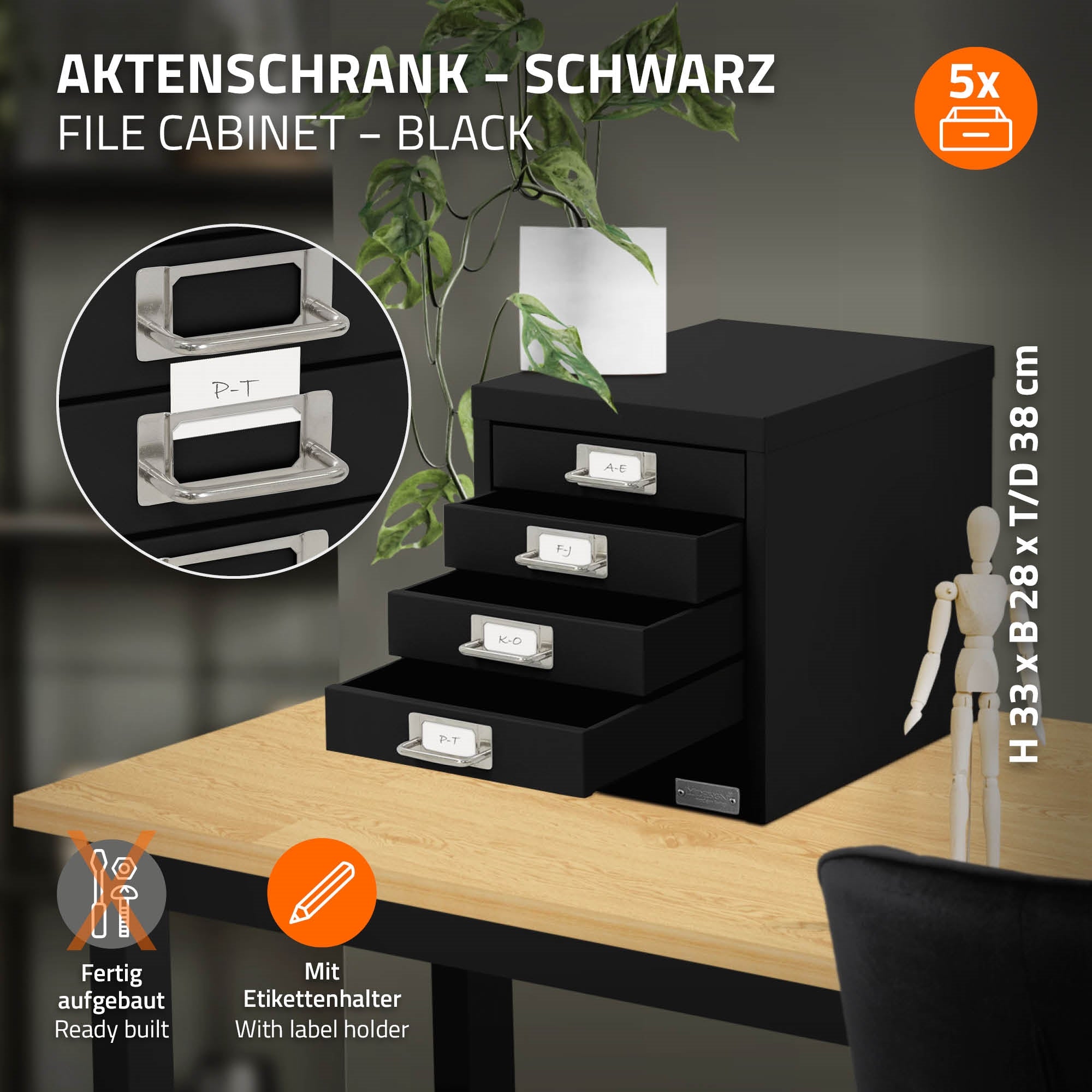 Schwarzer Aktenschrank mit vier Schubladen auf einem Tisch.