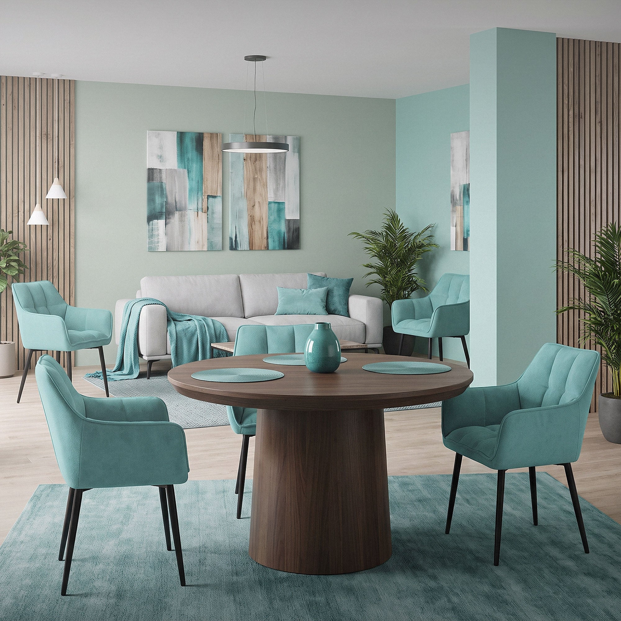 Wohnzimmer mit einem runden Tisch und mehreren Stühlen in Türkis.