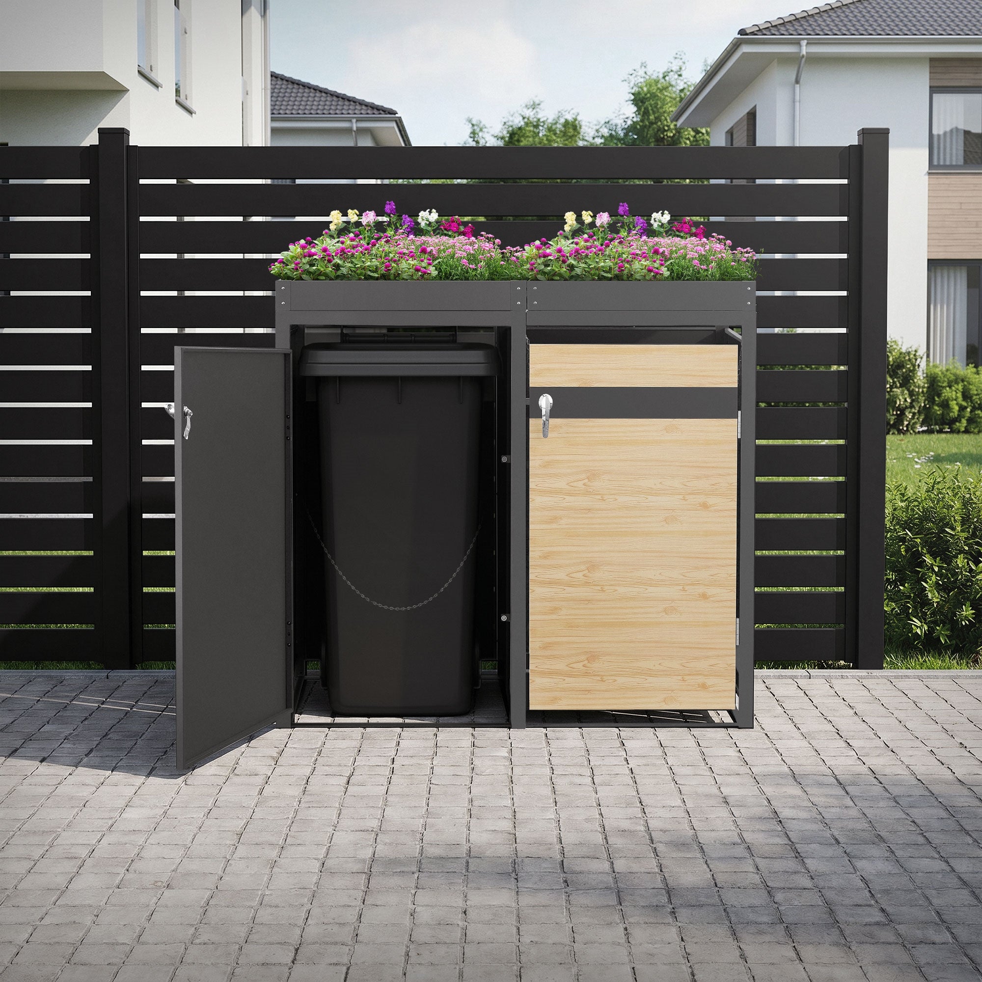 Mülltonnenbox mit Blumenbeet, offen und im Garten platziert.