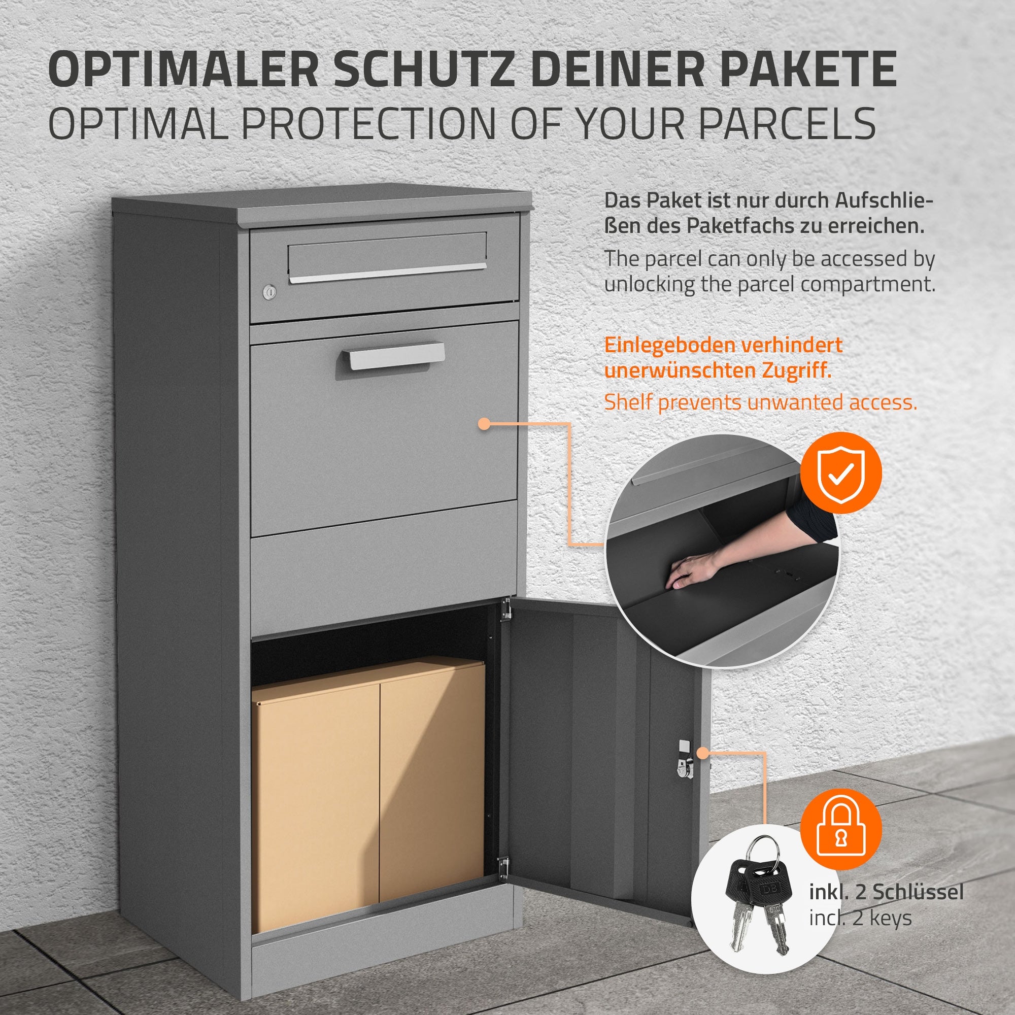 Paketfach des Briefkastens mit Tür und zwei Schlüsseln.