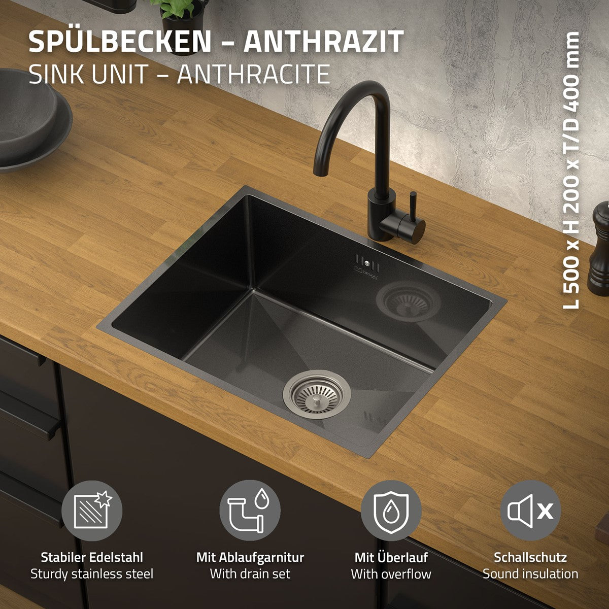 Anthracite-colored sink with drain and faucet on a wooden countertop.