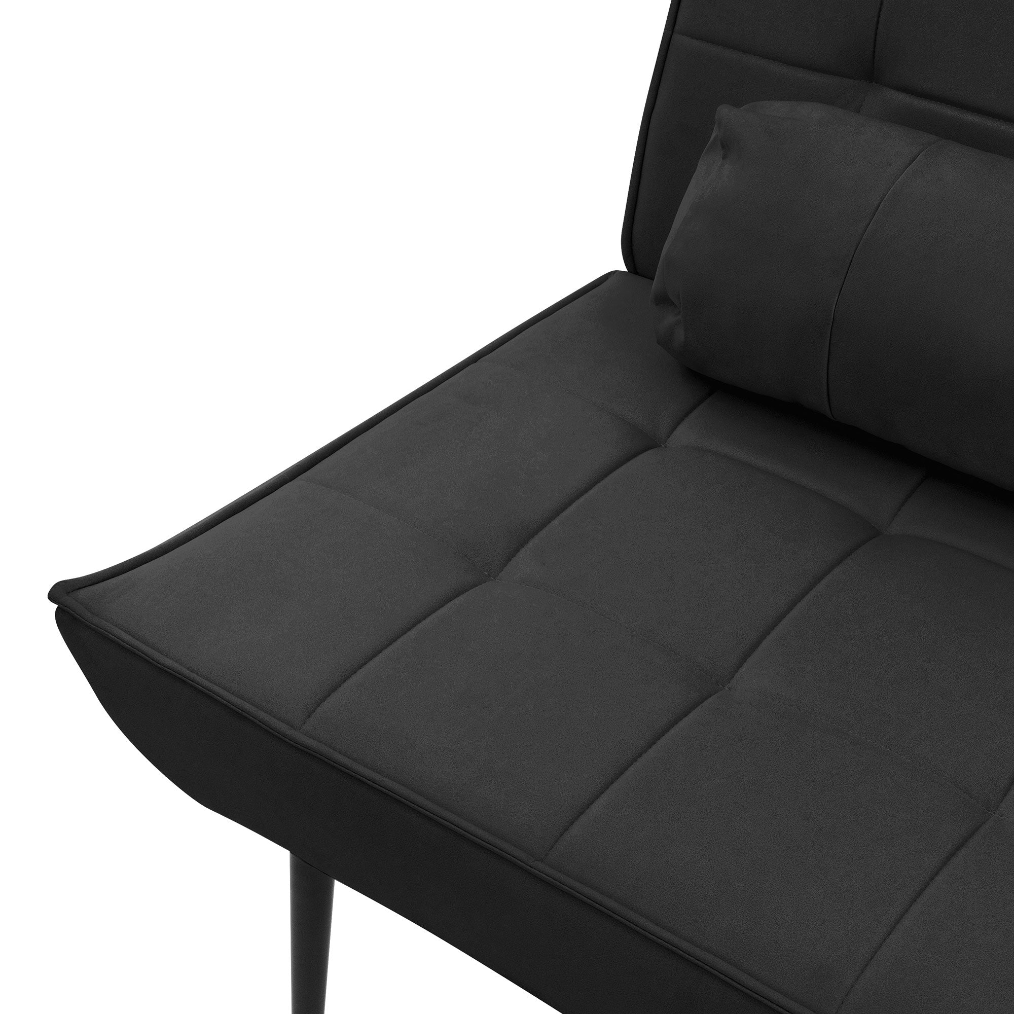 Sillón negro con cojines, vista detallada del asiento.