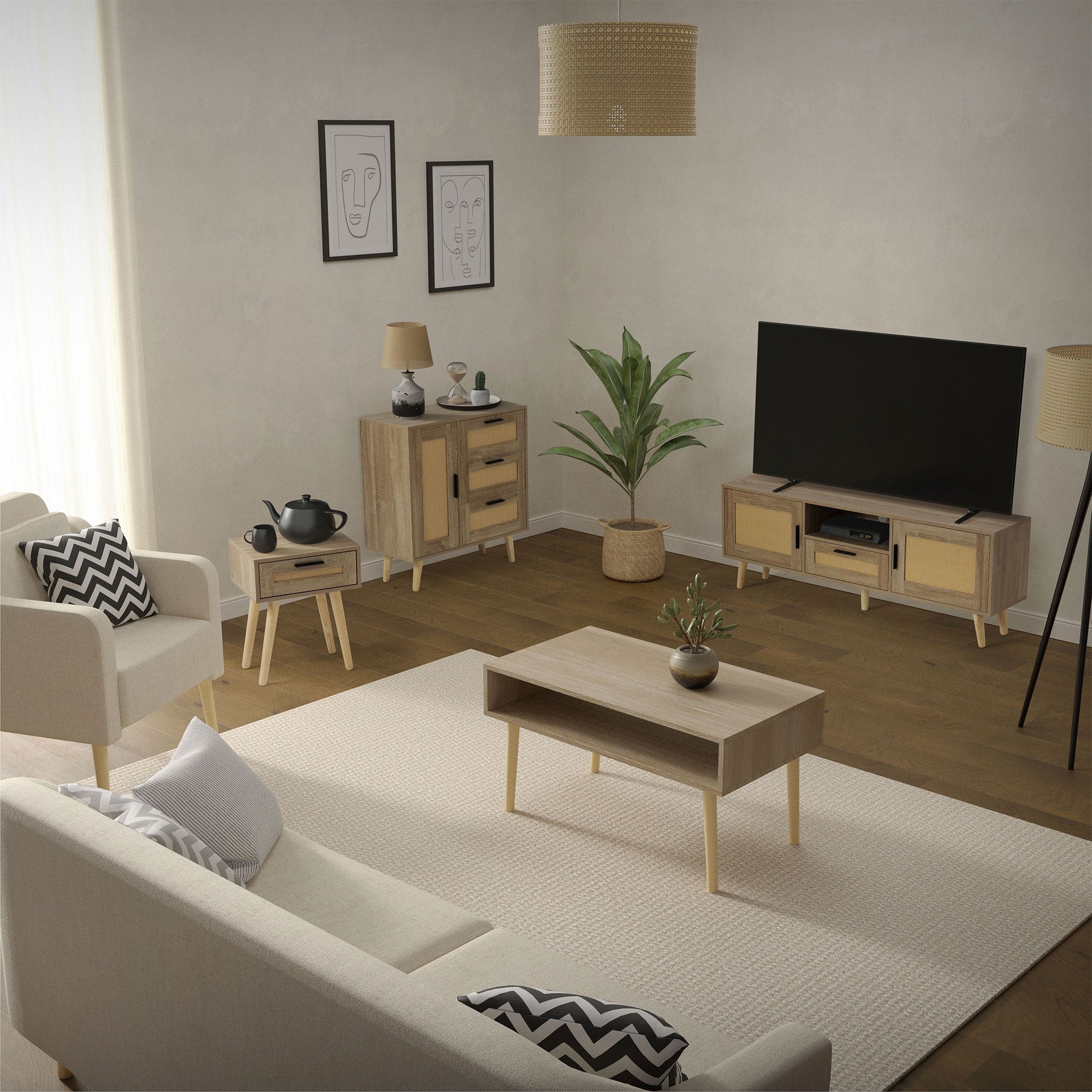 Living room with sofa, coffee table, TV furniture, plants, and pictures on the wall.