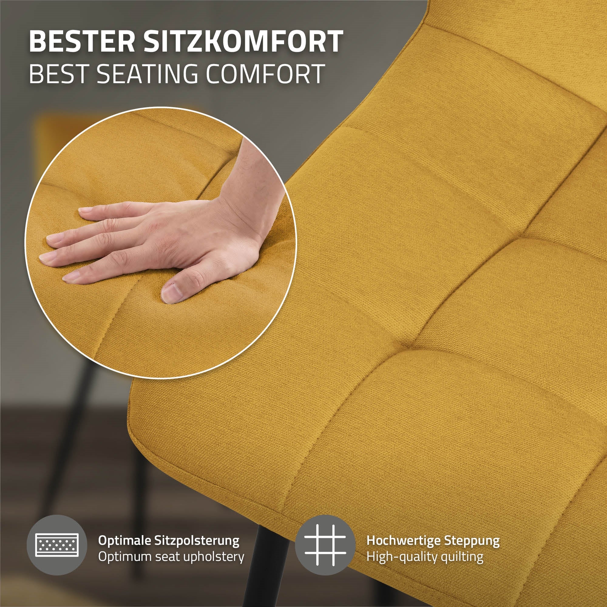 Nahaufnahme einer Hand auf einem gelben Stuhlpolster mit Textinformationen.
