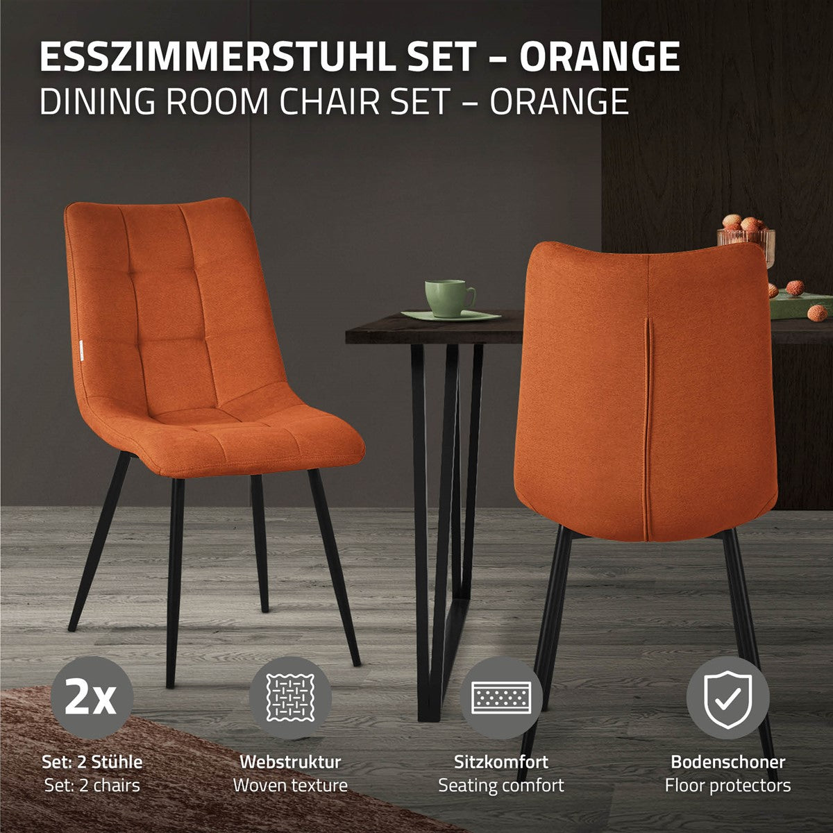 To orange stole og et bord i et moderne rum.