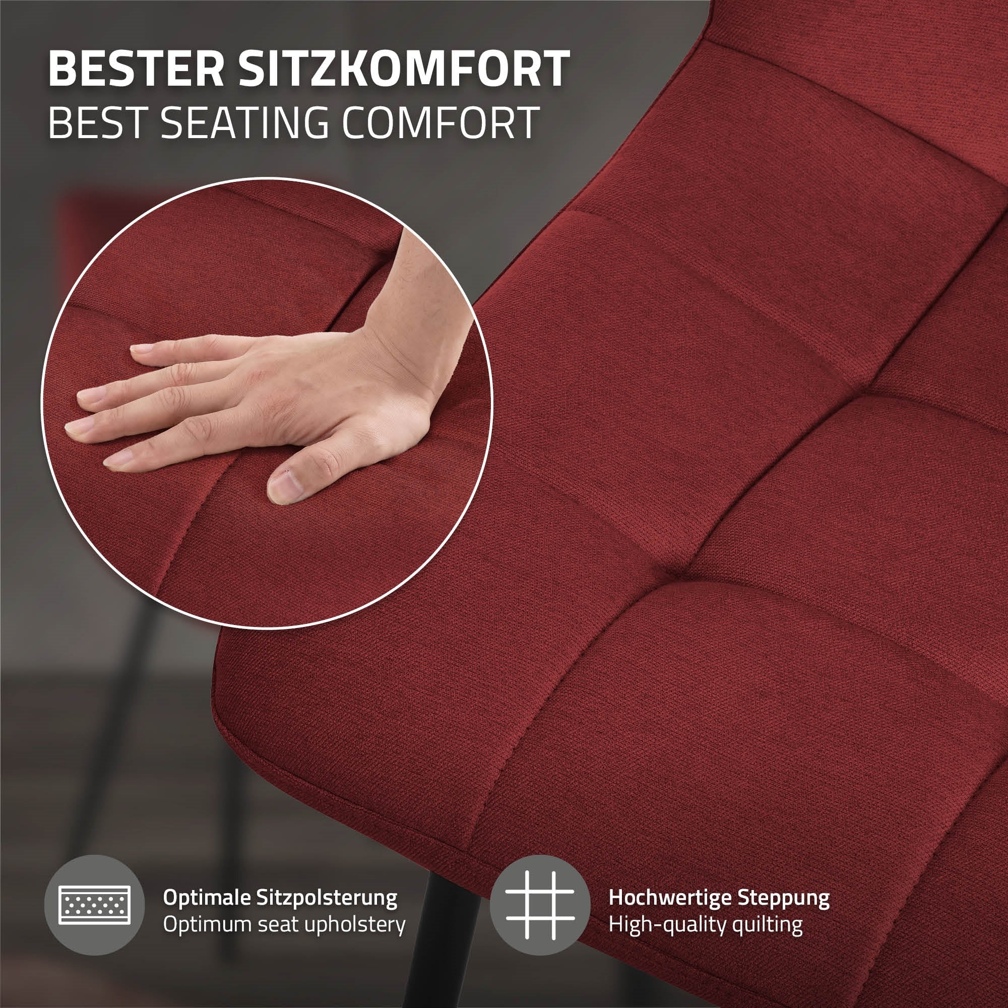Nahaufnahme einer Hand auf einem roten Stuhl mit gepolsterter Sitzfläche.