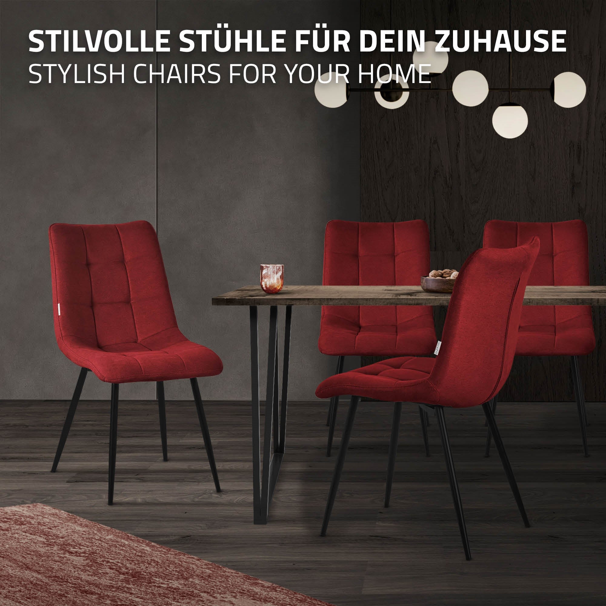 Rote Stühle um einen Tisch in einem modernen Raum mit dekorativen Lampen.