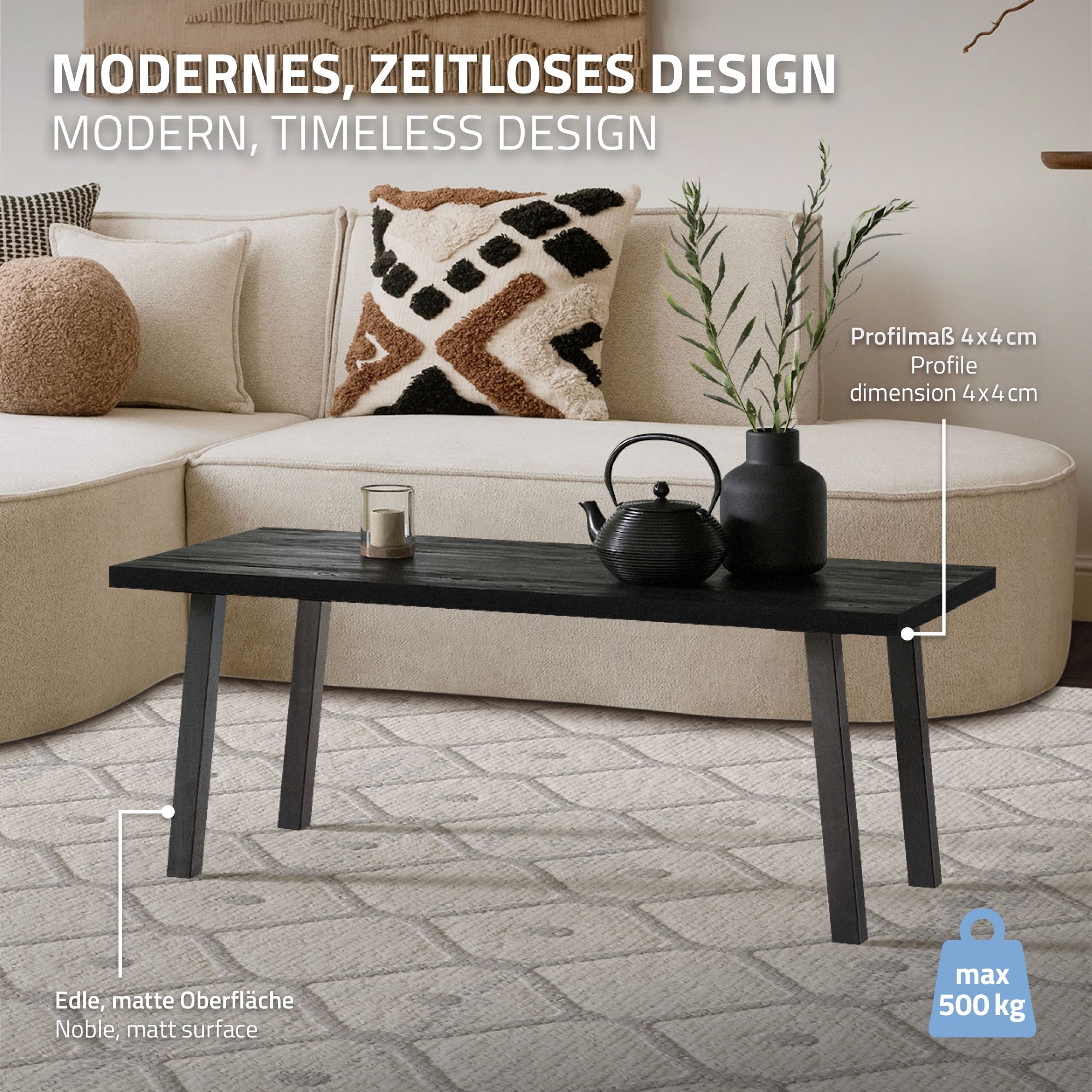 Table noire avec théière sur un tapis clair dans un salon moderne.