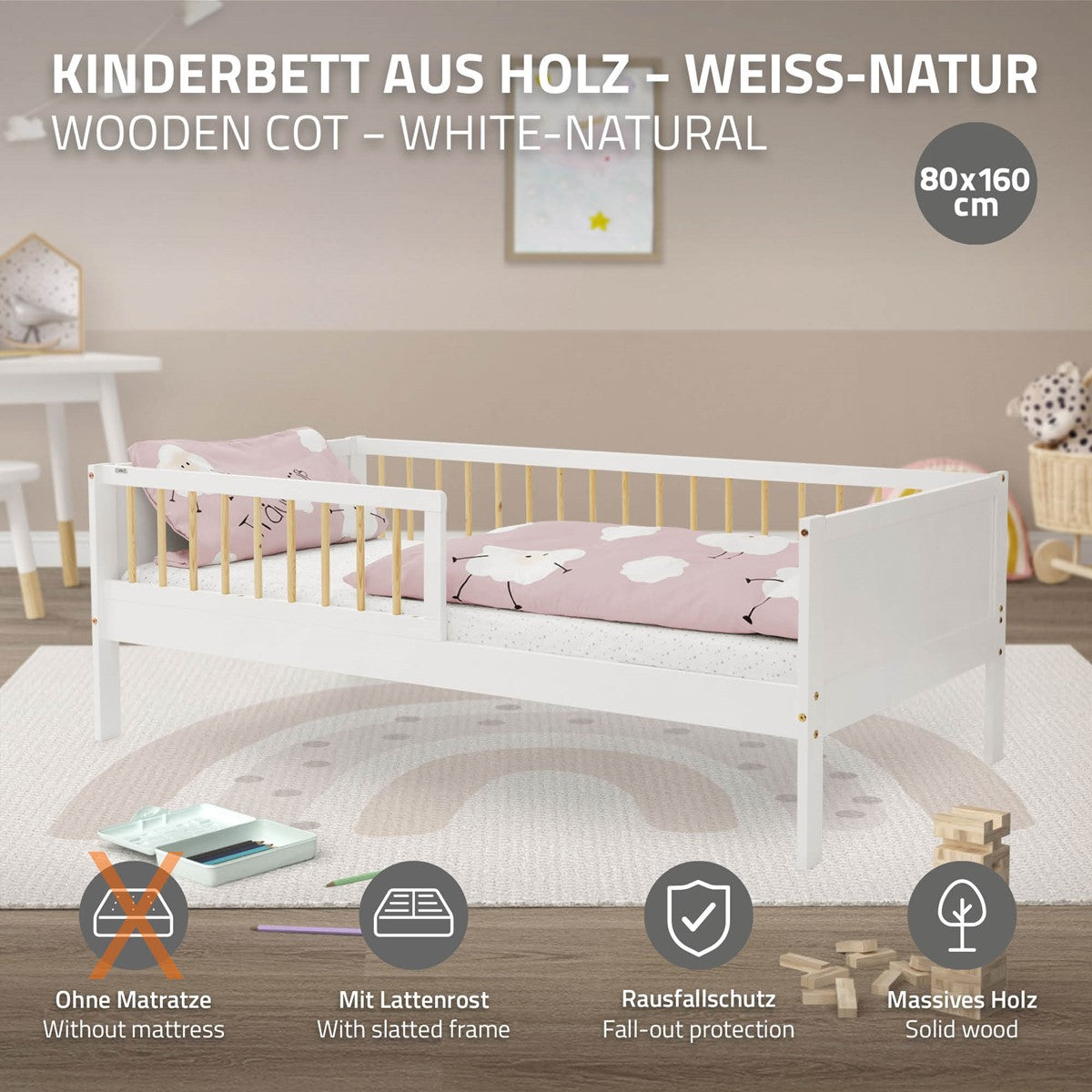 Ein weißes Kinderbett aus Holz mit einem rosa Kissen und ohne Matratze.