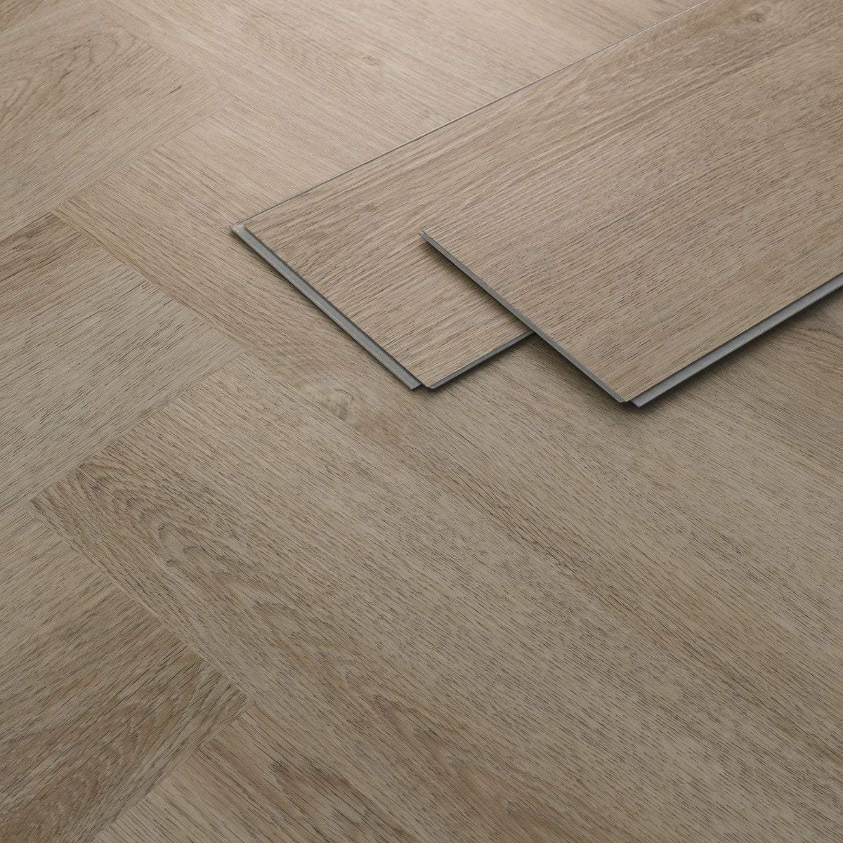 Wooden floor with laid planks in a light shade.