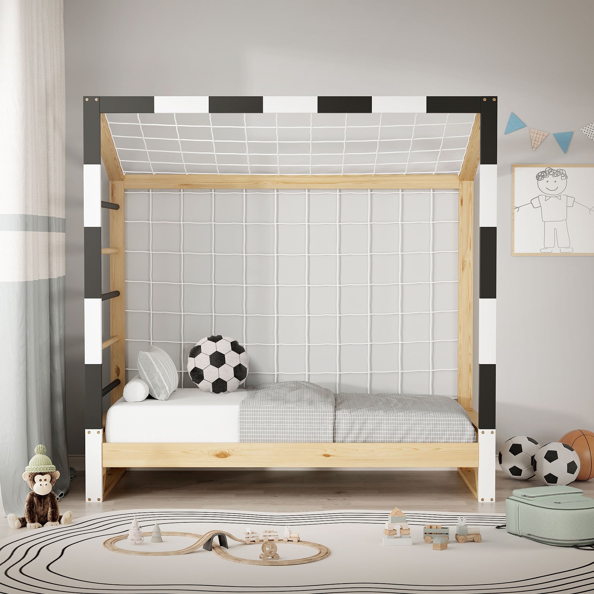 Ein Bett mit einem Fußball und einem grauen Laken in einem hellen Raum.